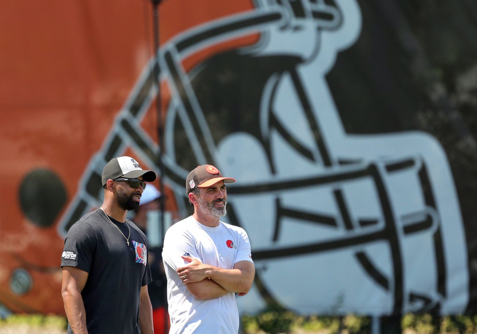 Browns general manager Andrew Berry, left, and head coach Kevin Stefanski watch practice during minicamp, Thursday, June 13, 2024, in Berea. NFL