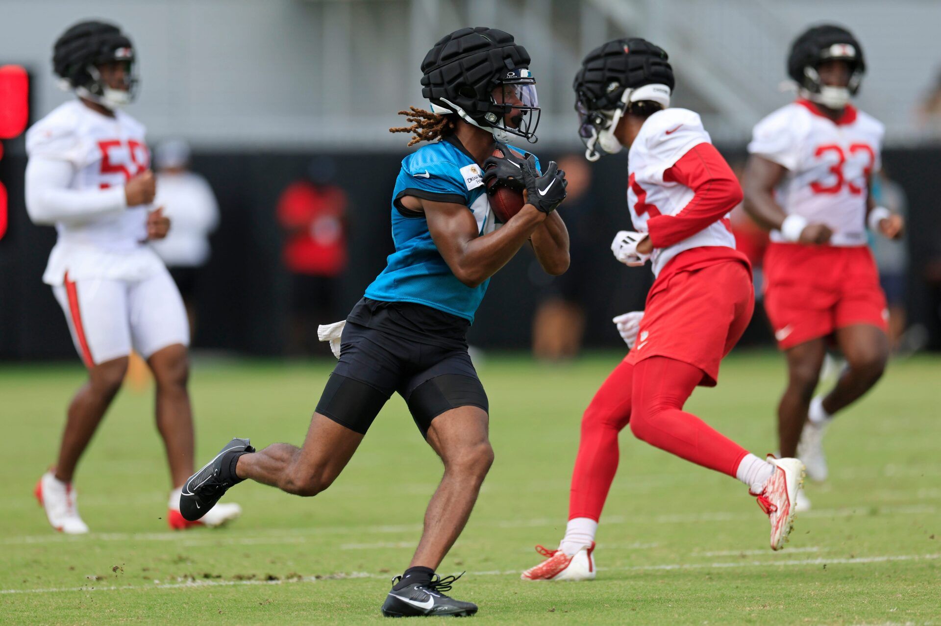 Jacksonville Jaguars wide receiver Joshua Cephus (19) runs the ball during a combined NFL football training camp session between the Tampa Bay Buccaneers and Jacksonville Jaguars Thursday, Aug. 15, 2024 at EverBank Stadium’s Miller Electric Center in Jacksonville, Fla. [Corey Perrine/Florida Times-Union]