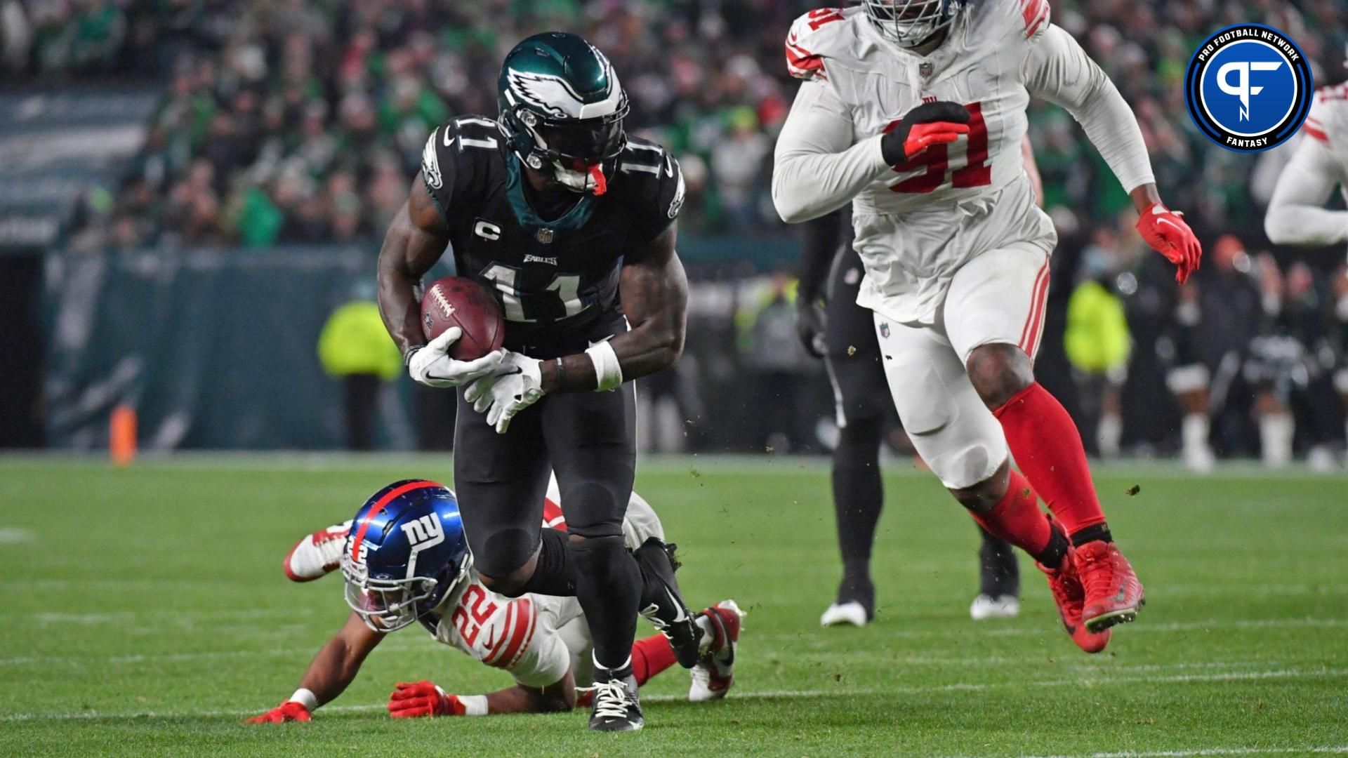 Philadelphia Eagles wide receiver A.J. Brown (11) runs with the ball against the New York Giants at Lincoln Financial Field. Should you take him seventh in your fantasy football draft?