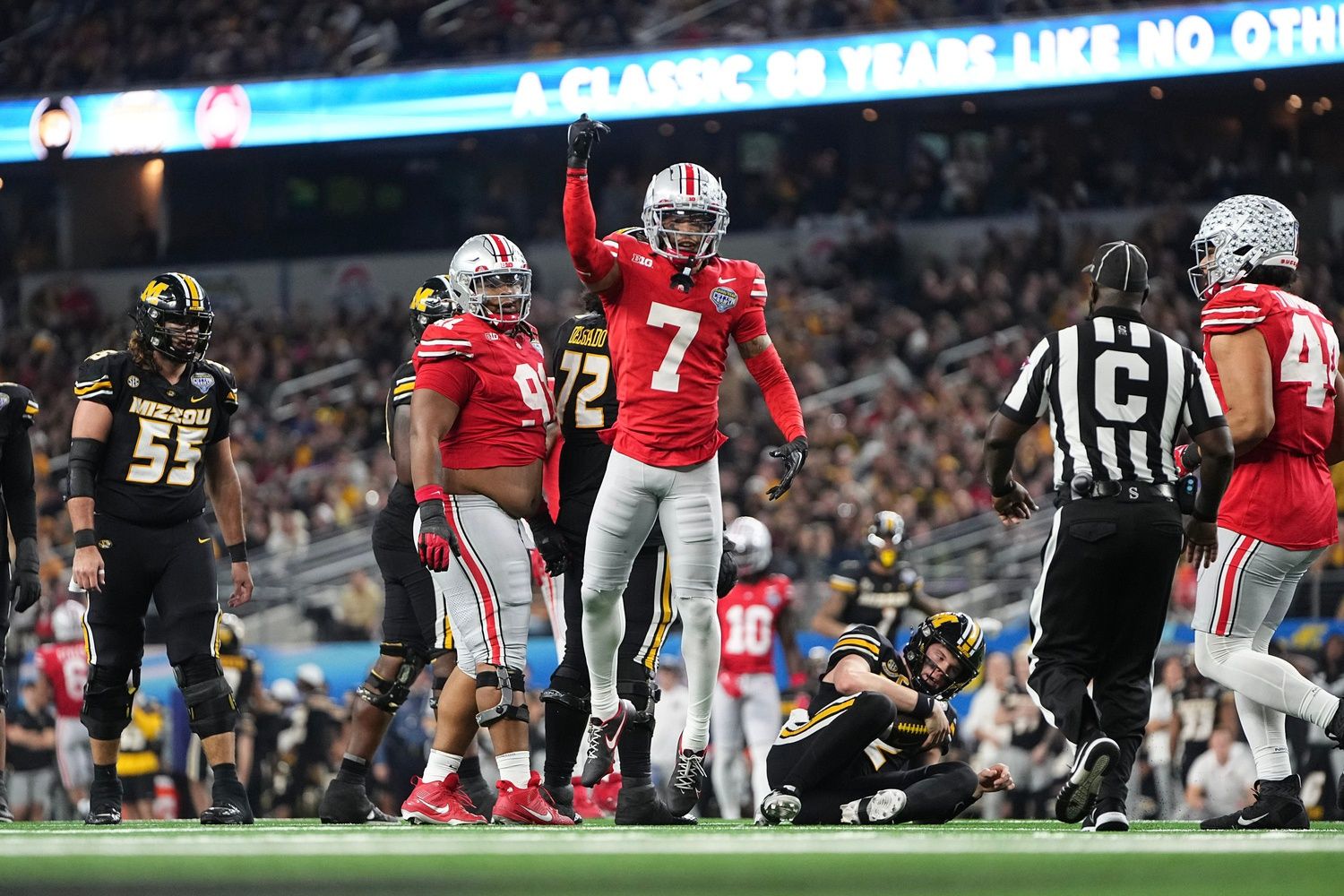 Ohio State Buckeyes cornerback Jordan Hancock (7) celebrates a sack during the fourth quarter of the Goodyear Cotton Bowl Classic against the Missouri Tigers at AT&T Stadium. Ohio State lost 14-3.