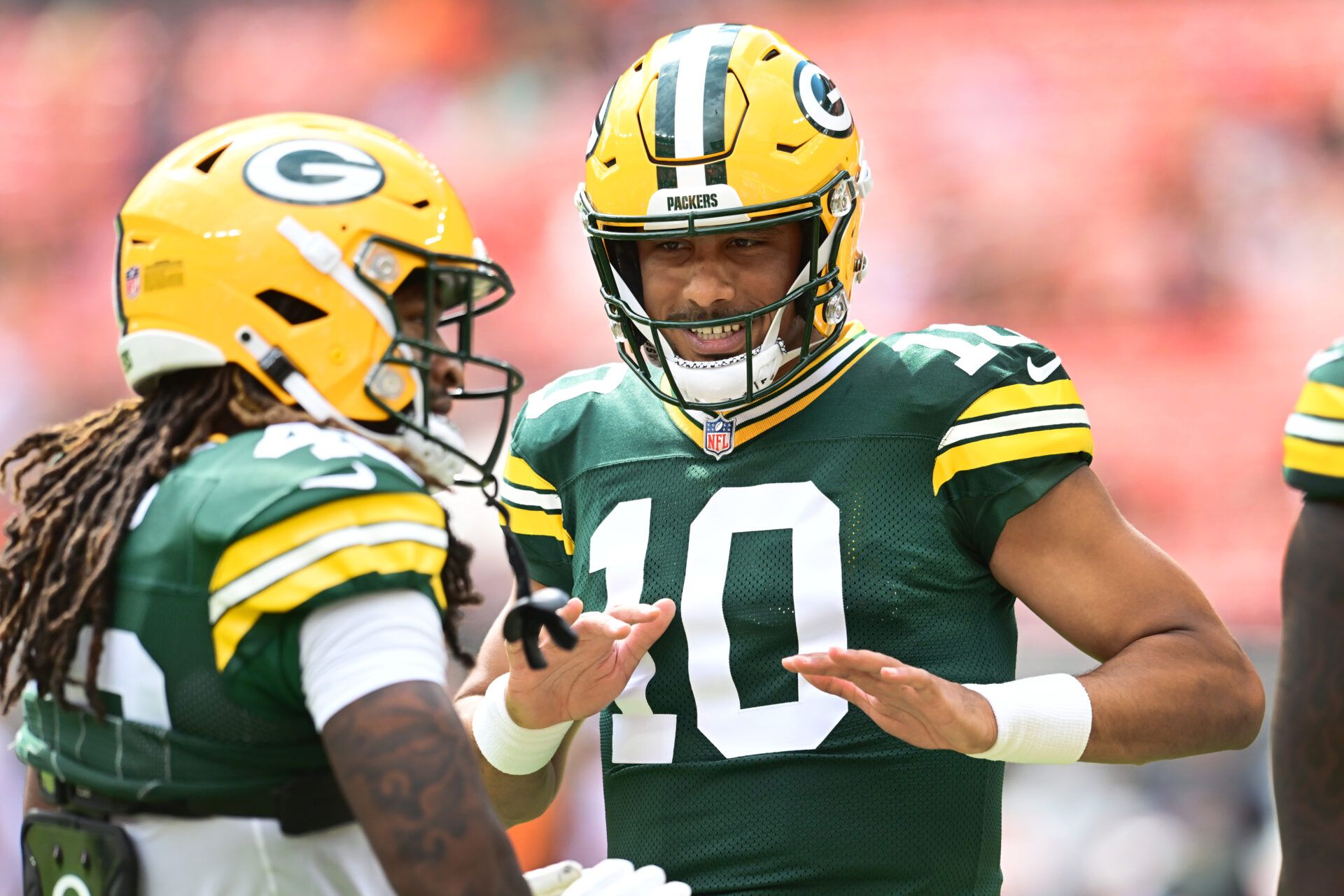 Aug 10, 2024; Cleveland, Ohio, USA; Green Bay Packers quarterback Jordan Love (10) talks to teammates before the game between the Packers and the Cleveland Browns at Cleveland Browns Stadium. Mandatory Credit: Ken Blaze-USA TODAY Sports