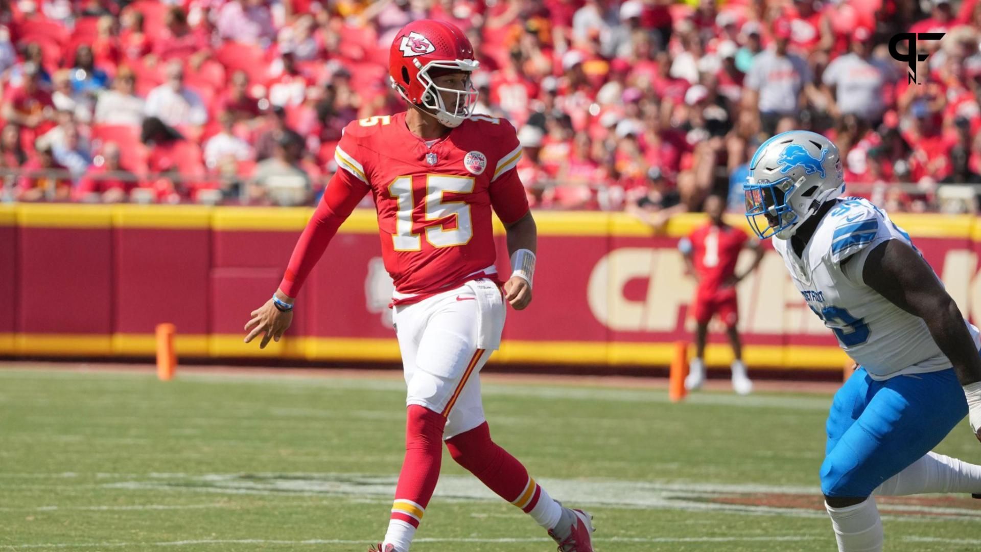 Kansas City Chiefs quarterback Patrick Mahomes (15) throws a behind-the-back underhand pass to tight end Travis Kelce (87) (not pictured) against the Detroit Lions during the first half at GEHA Field at Arrowhead Stadium. Mandatory Credit: Denny Medley-USA TODAY Sports