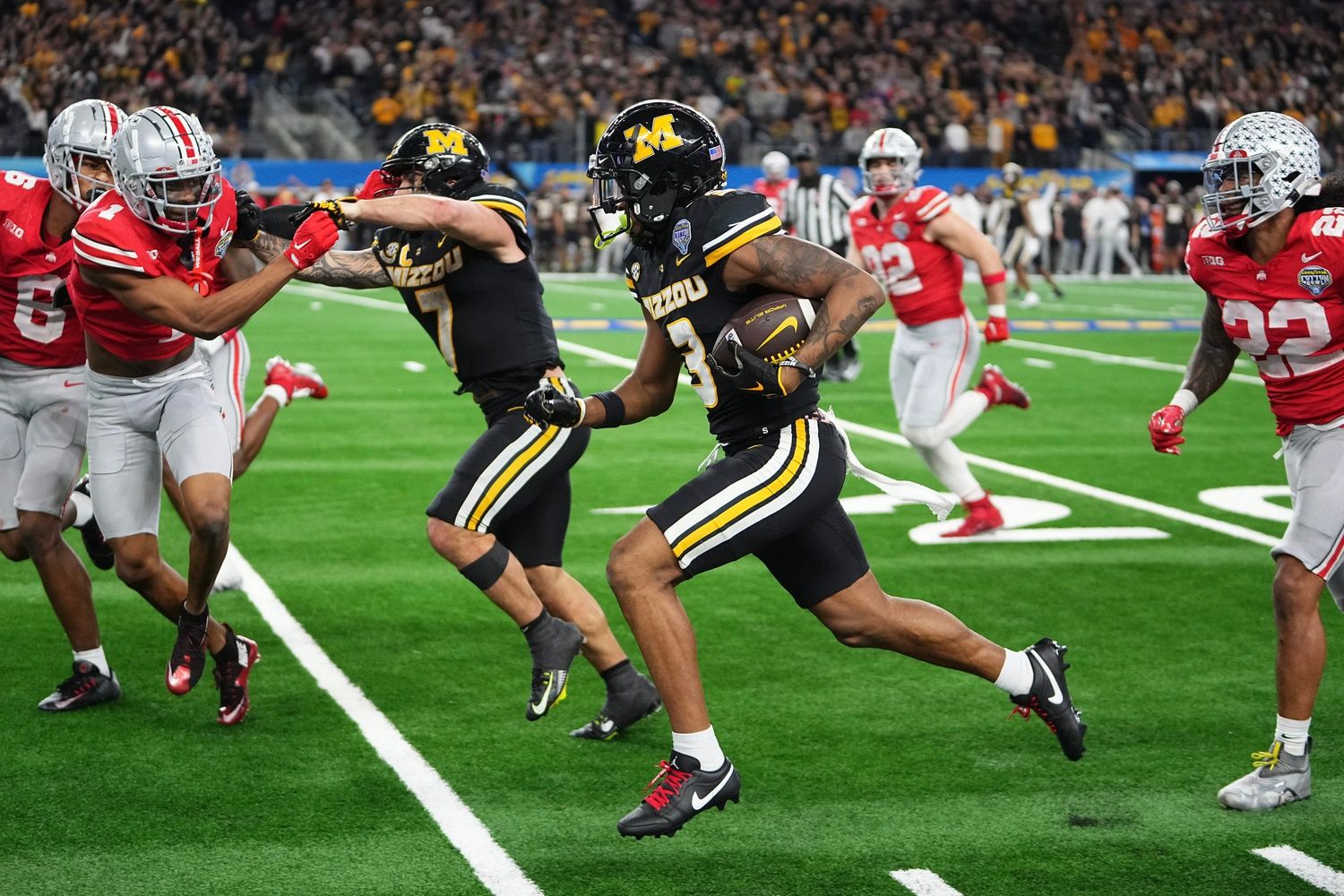 Missouri Tigers wide receiver Luther Burden III (3) runs upfield during the fourth quarter of the Goodyear Cotton Bowl Classic against the Ohio State Buckeyes at AT&T Stadium.