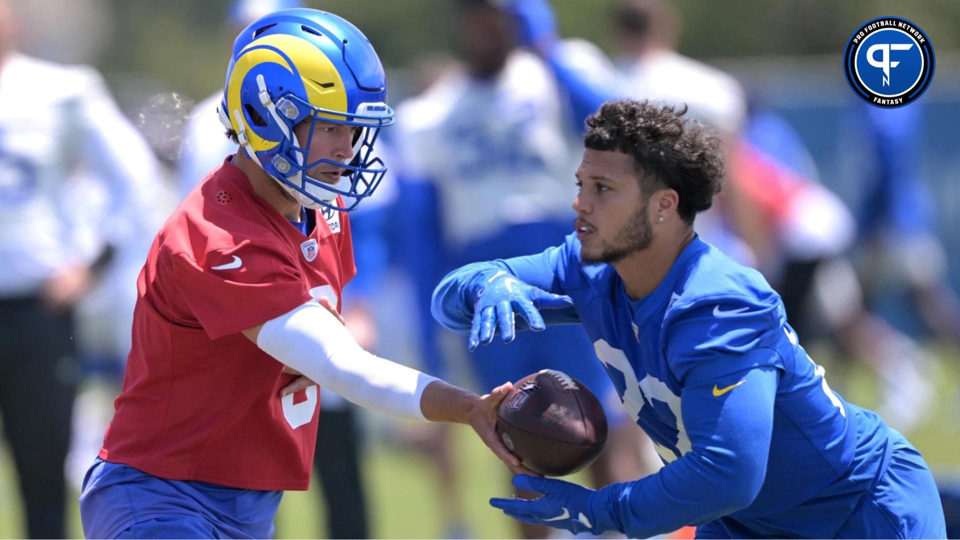 Los Angeles Rams quarterback Matthew Stafford (9) hands off to running back Blake Corum (22) during OTAs at California Lutheran University. Mandatory Credit: Jayne Kamin-Oncea-USA TODAY Sports