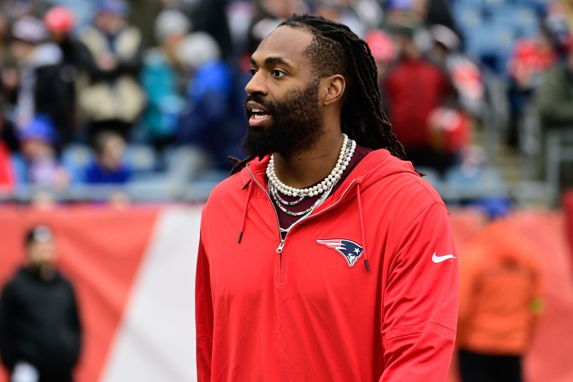 New England Patriots linebacker Matthew Judon (9) greets fans before a game against the Kansas City Chiefs at Gillette Stadium. Mandatory Credit: Eric Canha-USA TODAY Sports