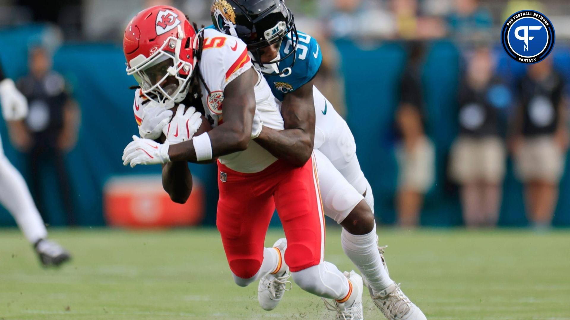 Jacksonville Jaguars cornerback Montaric Brown (30) tackles Kansas City Chiefs wide receiver Hollywood Brown (5) during the first quarter of a preseason NFL football game Saturday, Aug. 10, 2024 at Ev...