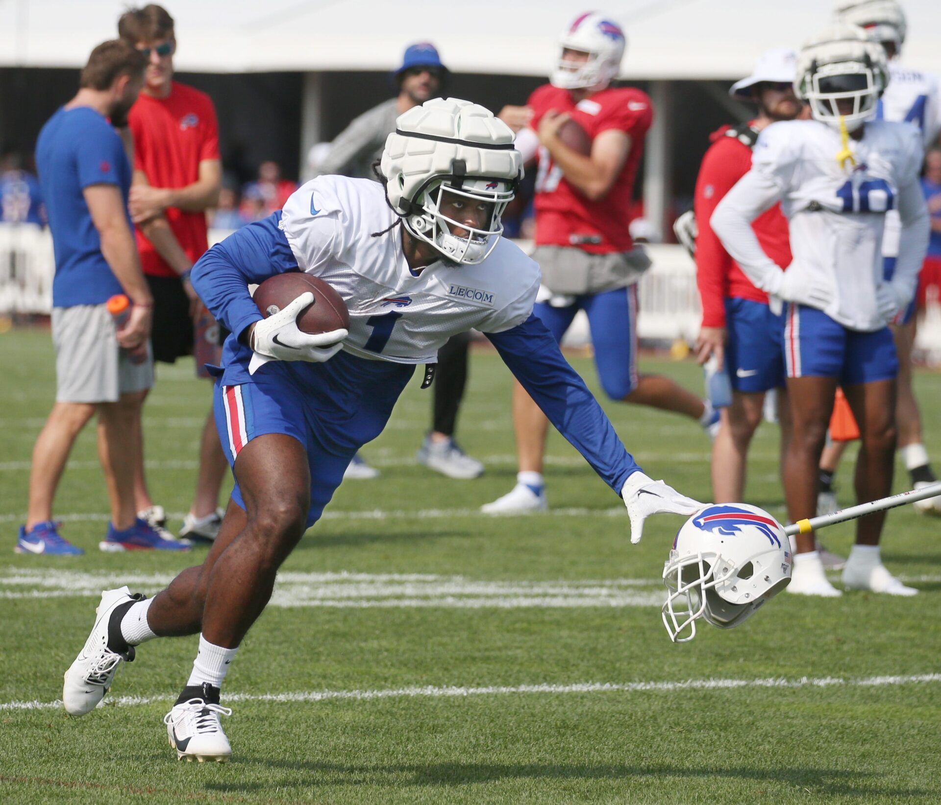 Bills wide receiver Curtis Samuel puts out the stiff arm.