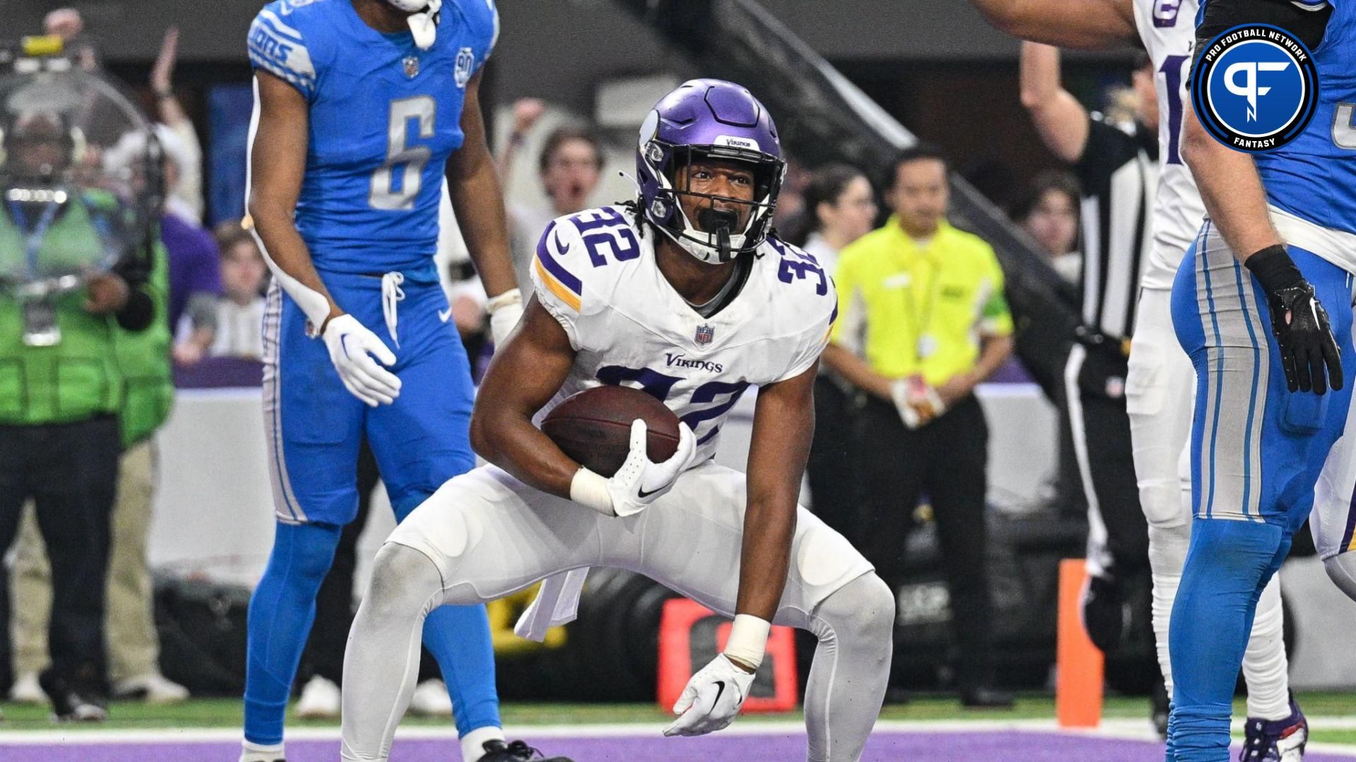 Dec 24, 2023; Minneapolis, Minnesota, USA; Minnesota Vikings running back Ty Chandler (32) reacts after scoring a touchdown against the Detroit Lions during the game at U.S. Bank Stadium. Mandatory Credit: Jeffrey Becker-USA TODAY Sports