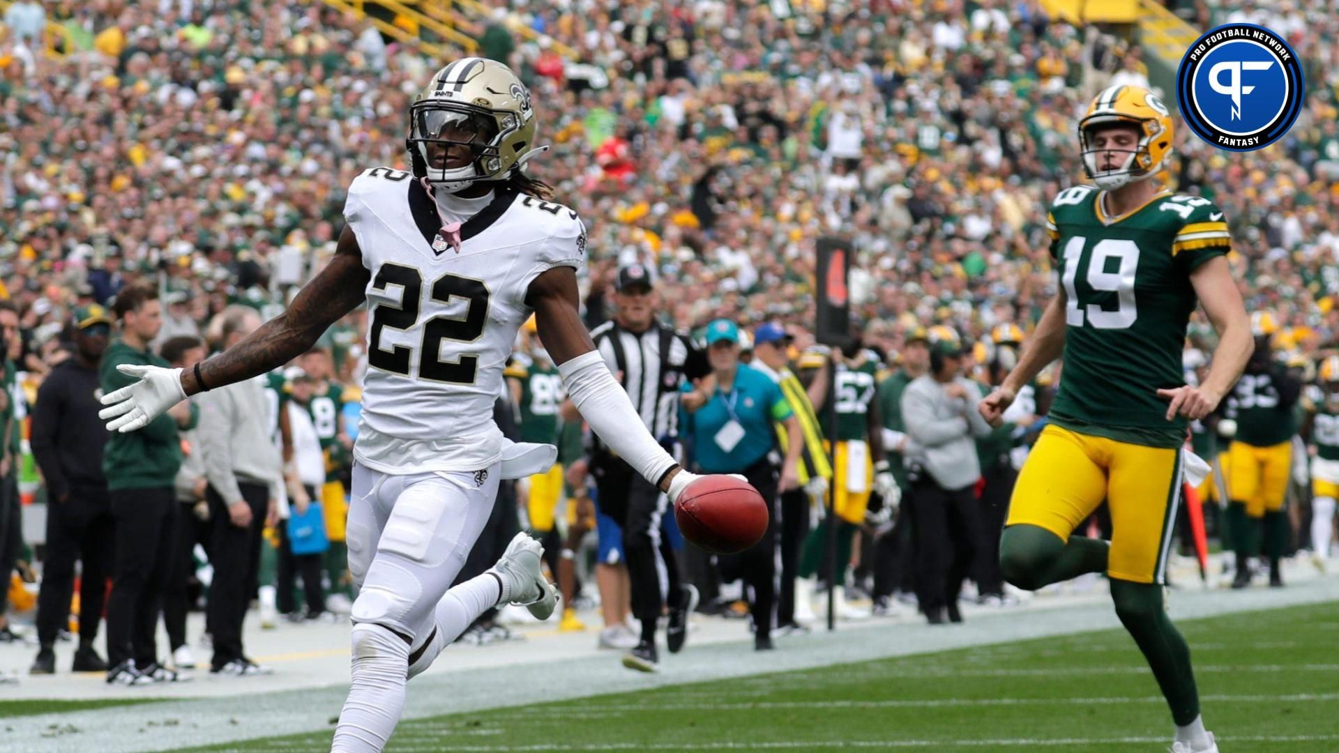 New Orleans Saints wide receiver Rashid Shaheed (22) scores a touchdown on punt against Green Bay Packers punter Daniel Whelan (19) in the second quarter during their football game Sunday, September 24, 2023, at Lambeau Field in Green Bay, Wis. Dan Powers/USA TODAY NETWORK-Wisconsin.