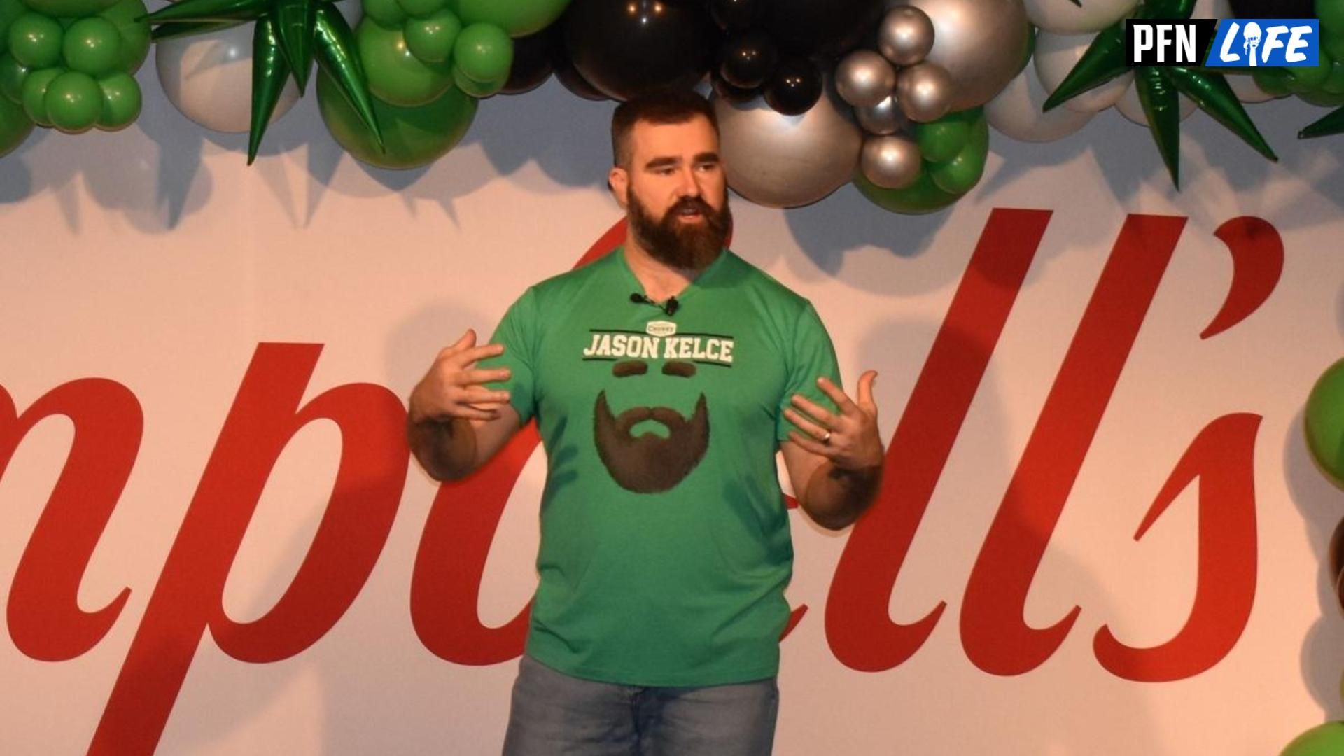 Retired Eagle Jason Kelce, wearing a shirt that promotes his Legend Edition Chunky soup can, addresses some 600 Campbell Soup Co. workers during a visit to the firm's Camden headquarters on March 20.