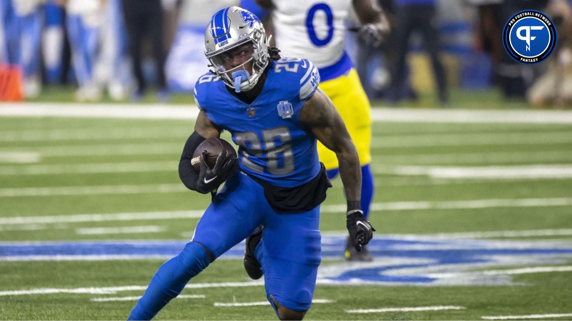 Detroit Lions running back Jahmyr Gibbs (26) runs during the first half of a 2024 NFC wild card game against the Los Angeles Rams at Ford Field. Mandatory Credit: David Reginek-USA TODAY Sports