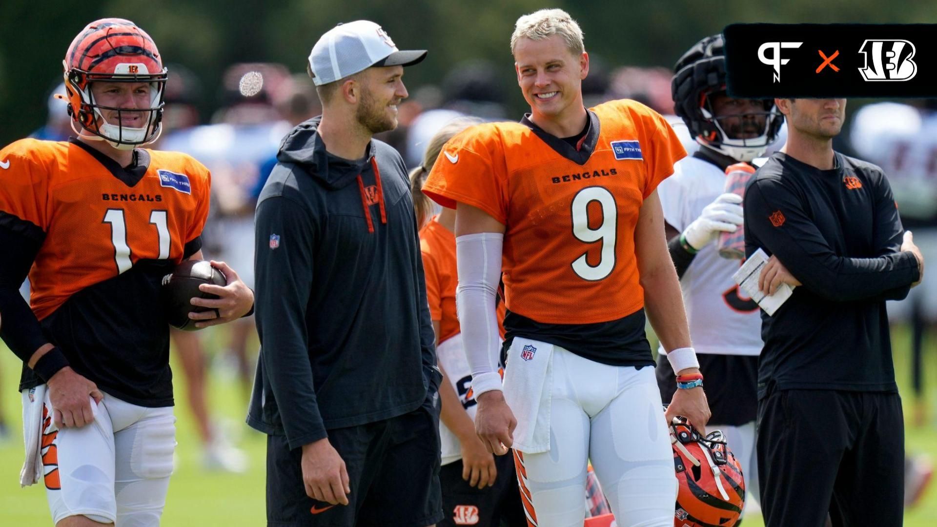 Cincinnati Bengals quarterback Joe Burrow (9) talks with quarterback Jake Browning during a preseason joint practice at the Paycor Stadium practice facility in downtown Cincinnati on Tuesday, Aug. 20, 2024.