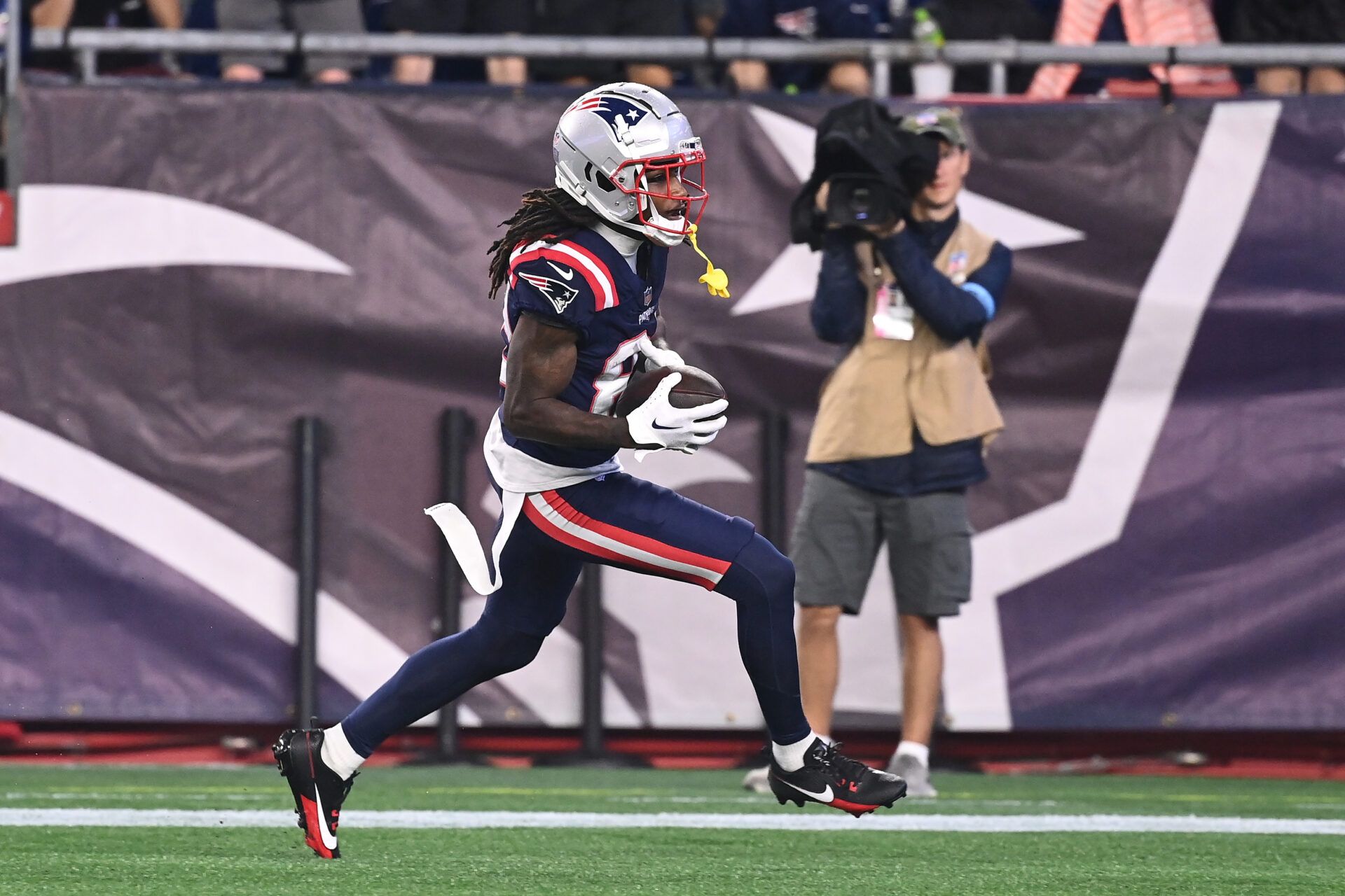 New England Patriots wide receiver JaQuae Jackson (82) scores a touchdown against the Carolina Panthers during the second half at Gillette Stadium.