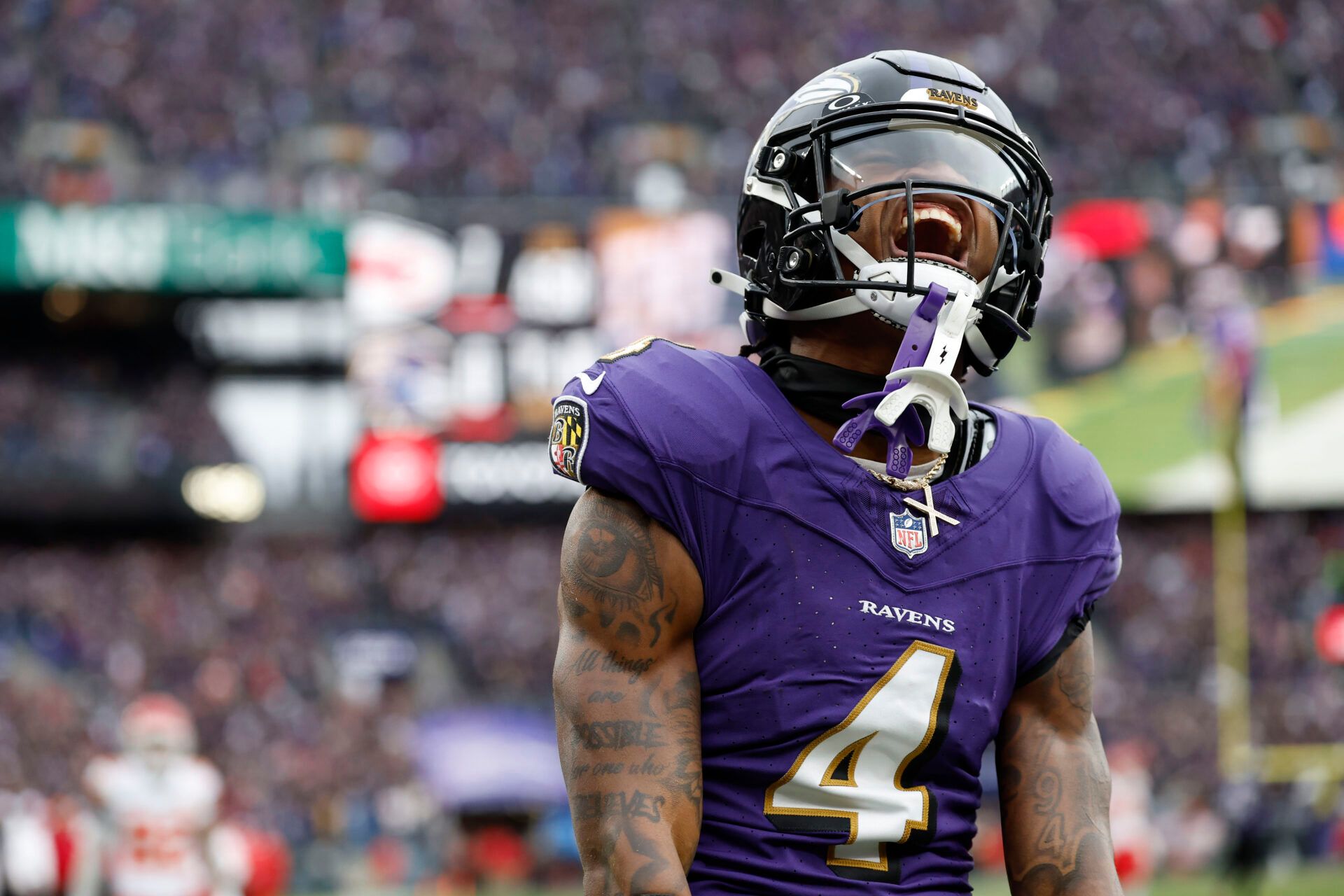 Jan 28, 2024; Baltimore, Maryland, USA; Baltimore Ravens wide receiver Zay Flowers (4) celebrates after scoring a touchdown against the Kansas City Chiefs during the first half in the AFC Championship football game at M&T Bank Stadium. Mandatory Credit: Geoff Burke-USA TODAY Sports