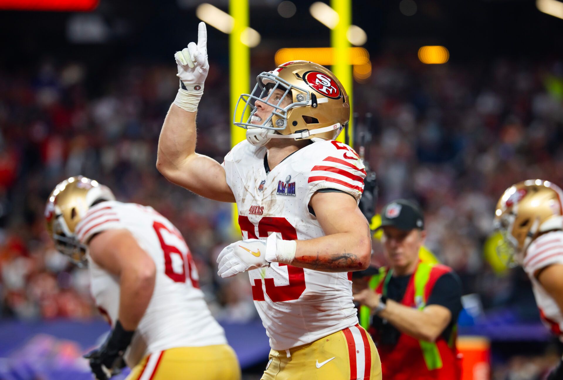 Feb 11, 2024; Paradise, Nevada, USA; San Francisco 49ers running back Christian McCaffrey (23) celebrates after scoring a touchdown in the first half of Super Bowl LVIII at Allegiant Stadium. Mandatory Credit: Mark J. Rebilas-USA TODAY Sports