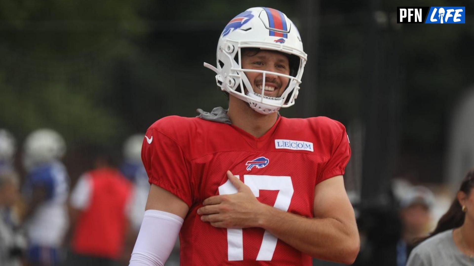 Bills Josh Allen laughs as he jokes with teammates as he moves to another practice field with other offensive players during Bills training camp at St. John Fisher University in Pittsford, NY on Aug. 5, 2024.