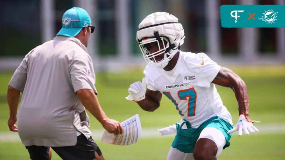 Miami Dolphins wide receiver Jaylen Waddle (17) works out during training camp at Baptist Health Training Complex.