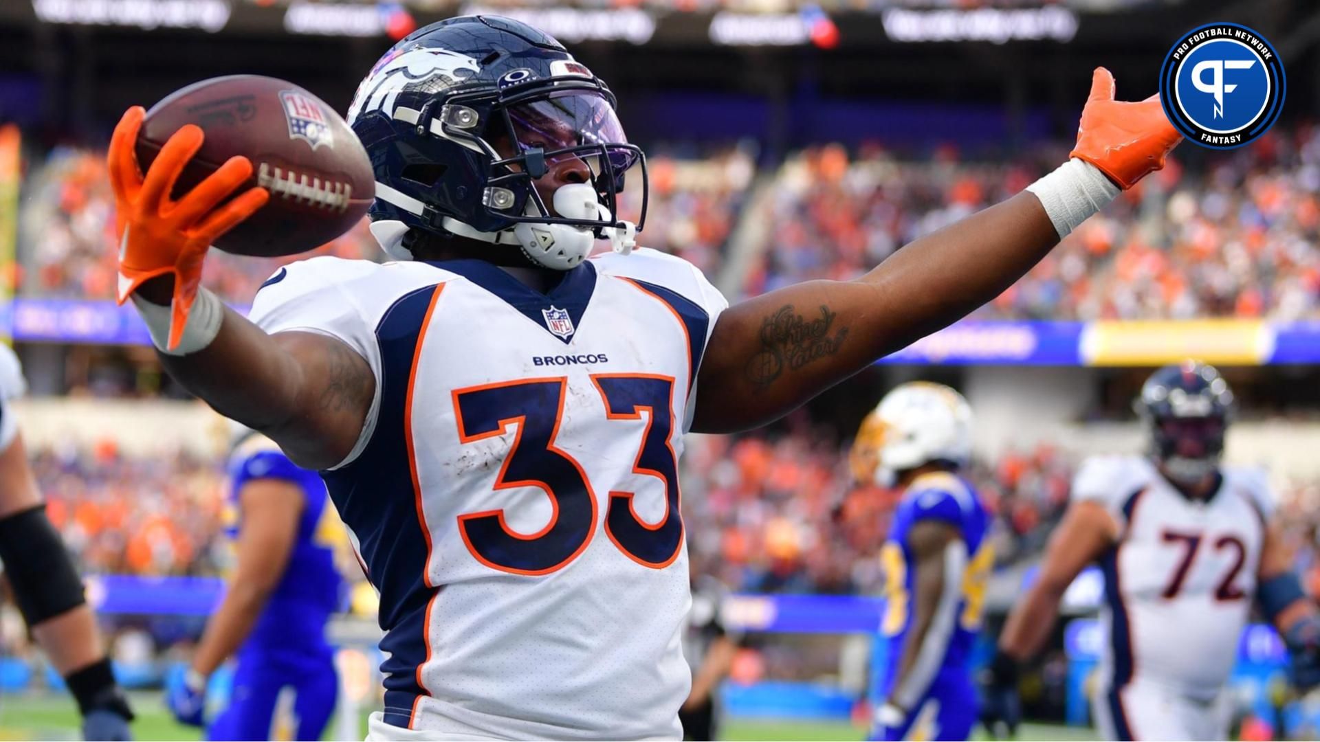 Denver Broncos running back Javonte Williams (33) celebrates his touchdown scored against the against the Los Angeles Chargers during the first half at SoFi Stadium. Mandatory Credit: Gary A. Vasquez-USA TODAY Sports