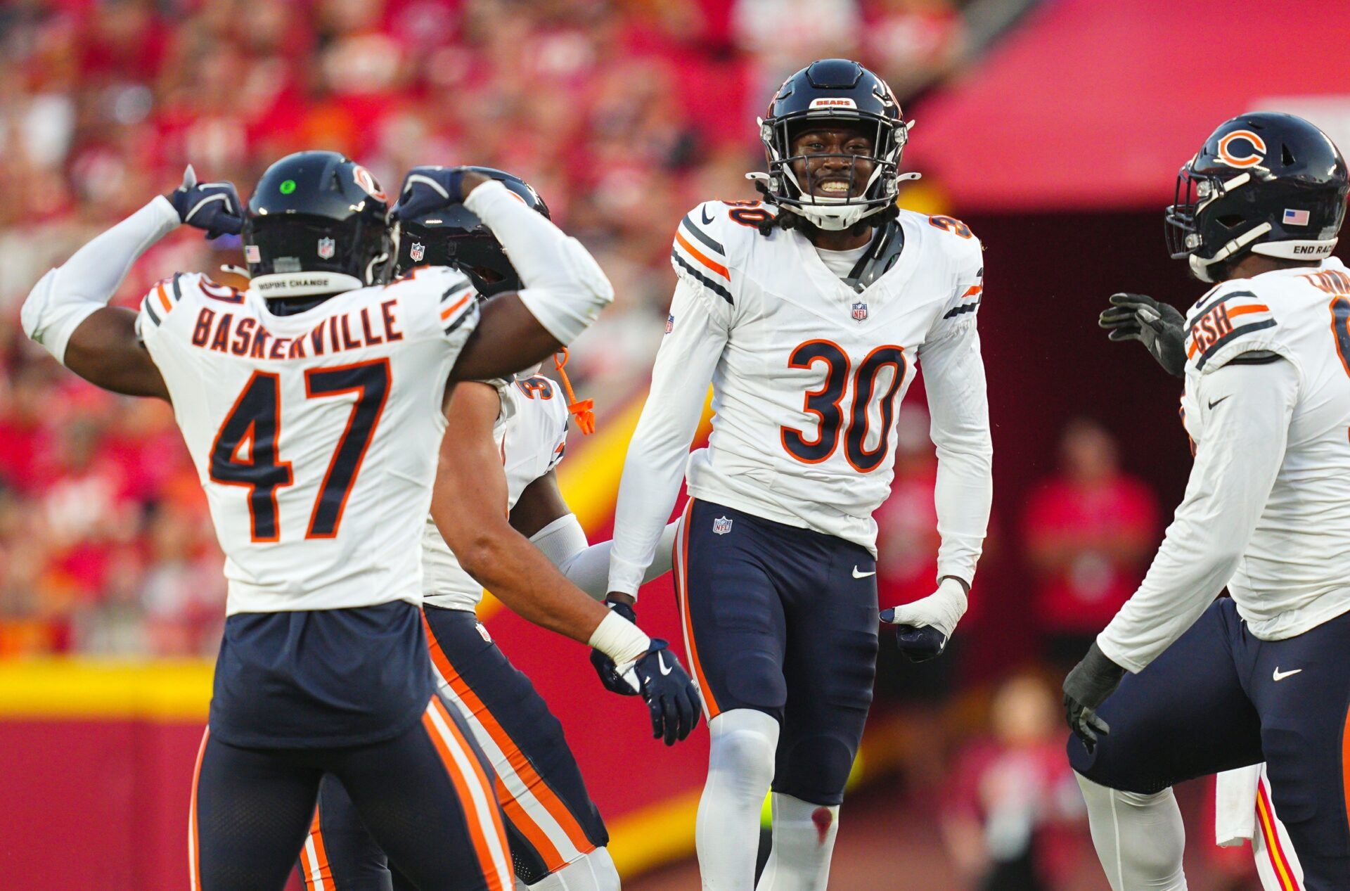 Aug 22, 2024; Kansas City, Missouri, USA; Chicago Bears safety Tarvarius Moore (30) celebrates with teammates after a play during the first half against the Kansas City Chiefs at GEHA Field at Arrowhead Stadium. Mandatory Credit: Jay Biggerstaff-USA TODAY Sports