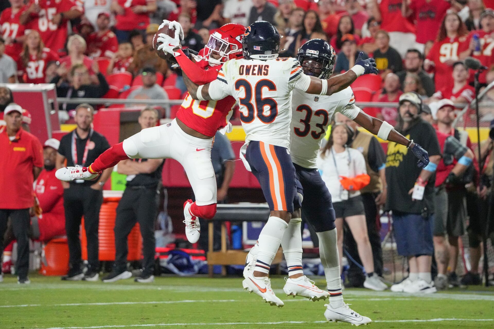 Kansas City Chiefs wide receiver Montrell Washington (80) catches a pass as Chicago Bears cornerback Ro Torrence (33) and safety Jonathan Owens (36) defend during the second half at GEHA Field at Arrowhead Stadium. Mandatory Credit: Denny Medley-USA TODAY Sports