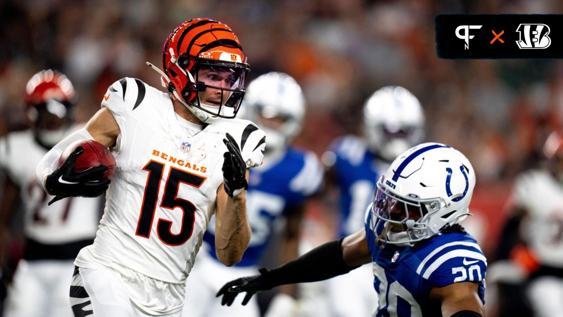 Cincinnati Bengals wide receiver Charlie Jones (15) returns a kickoff Indianapolis Colts safety Nick Cross (20) goes to tackle him in the first quarter of the NFL preseason game at Paycor Stadium in Cincinnati on Thursday, Aug. 22, 2024.