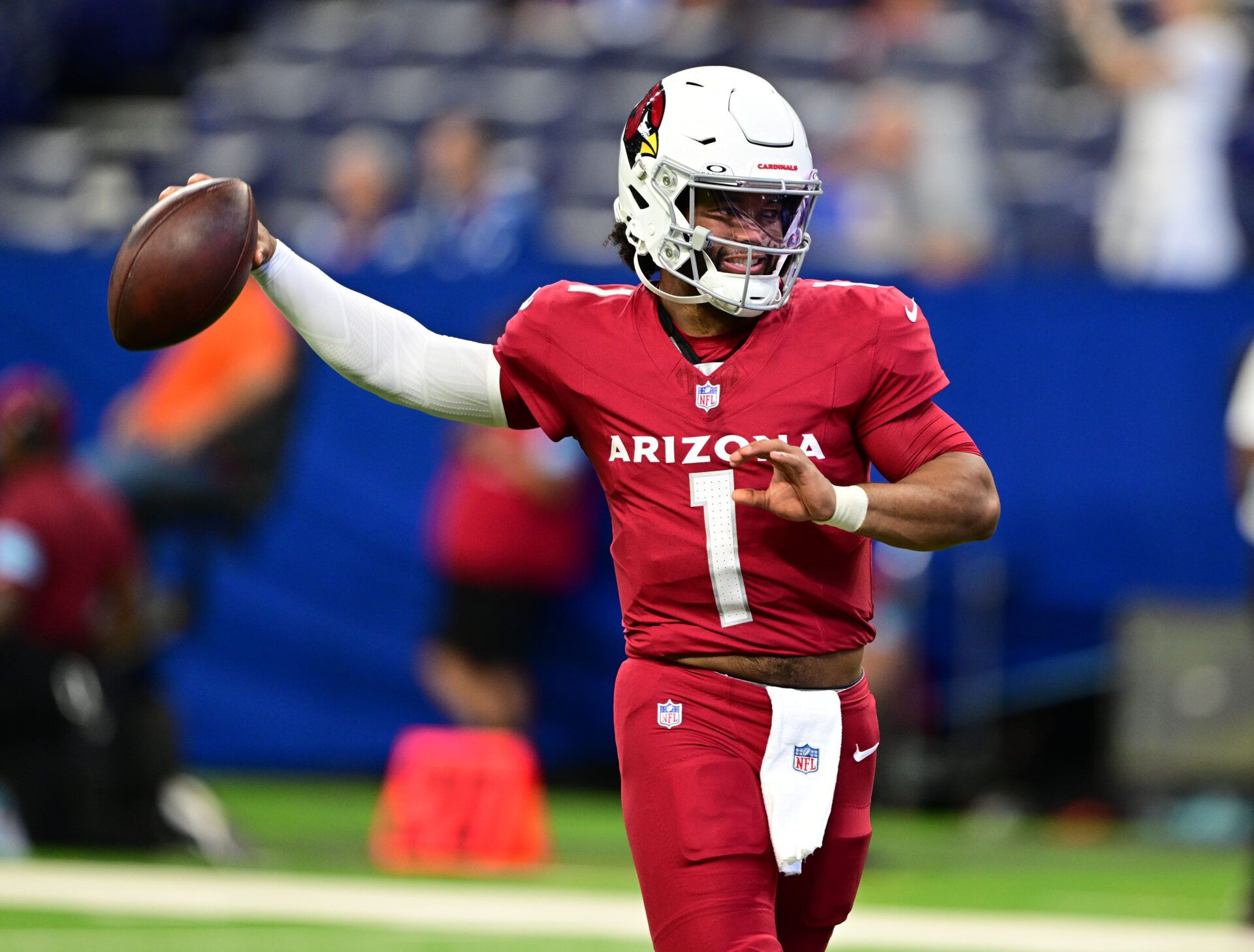 Aug 17, 2024; Indianapolis, Indiana, USA; Arizona Cardinals quarterback Kyler Murray (1) throws a pass to warm up before the game against the Indianapolis Colts at Lucas Oil Stadium. Mandatory Credit: Marc Lebryk-USA TODAY Sports