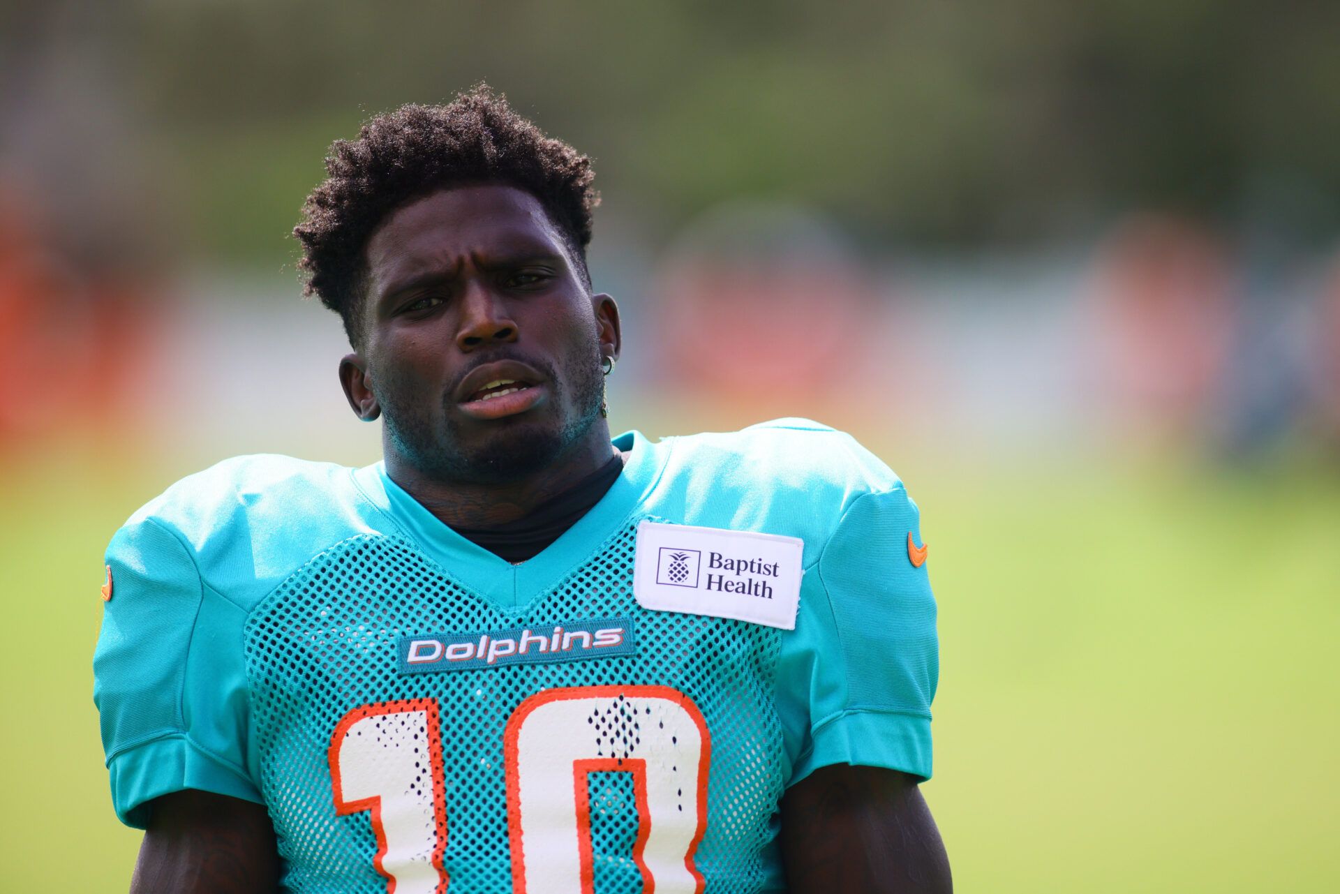 Aug 6, 2024; Miami Gardens, FL, USA; Miami Dolphins wide receiver Tyreek Hill (10) looks on during a joint practice with the Atlanta Falcons at Baptist Health Training Complex. Mandatory Credit: Sam Navarro-USA TODAY Sports