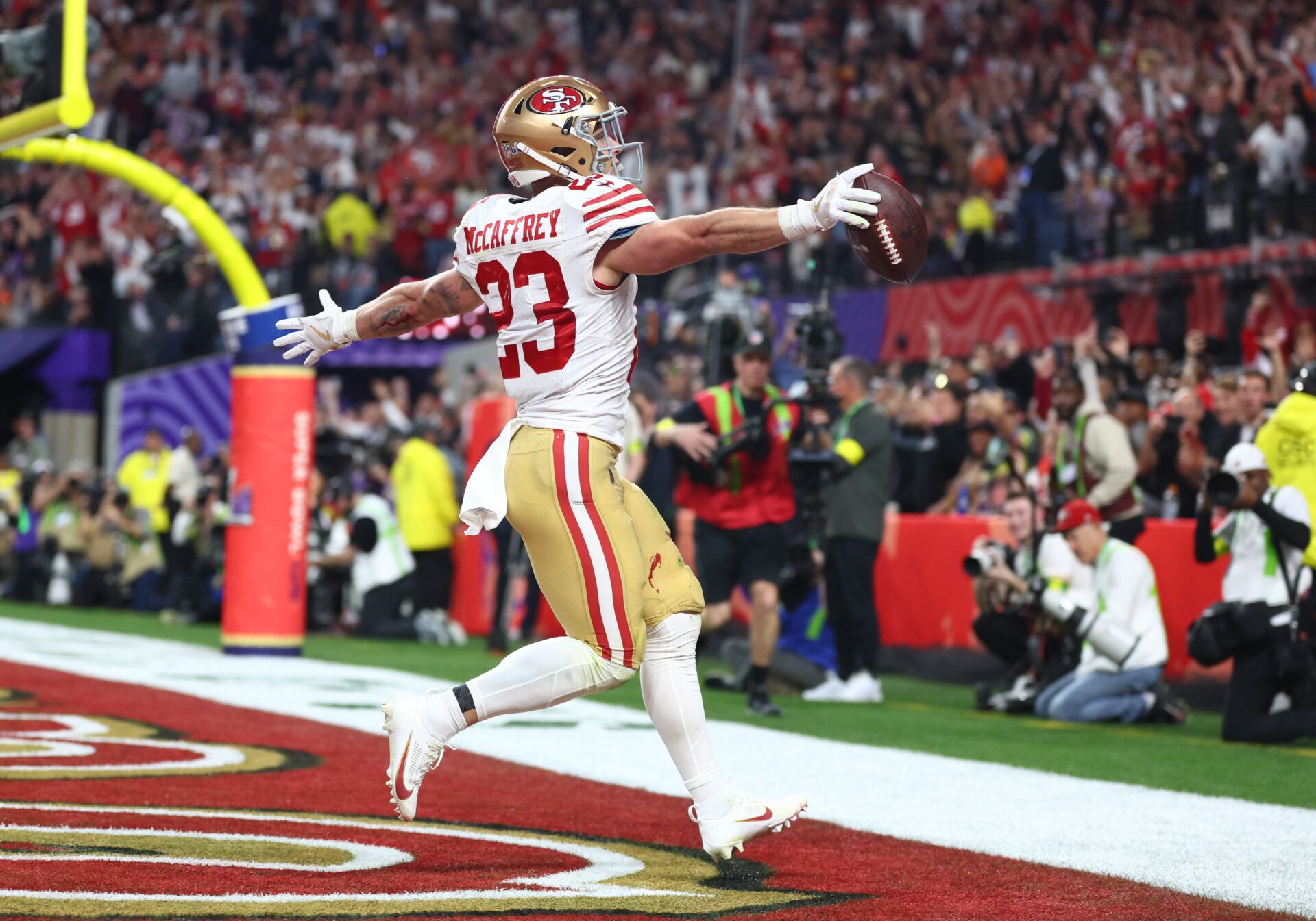 Feb 11, 2024; Paradise, Nevada, USA; San Francisco 49ers running back Christian McCaffrey (23) scores a touchdown in the first half of Super Bowl LVIII at Allegiant Stadium. Mandatory Credit: Mark J. Rebilas-USA TODAY Sports