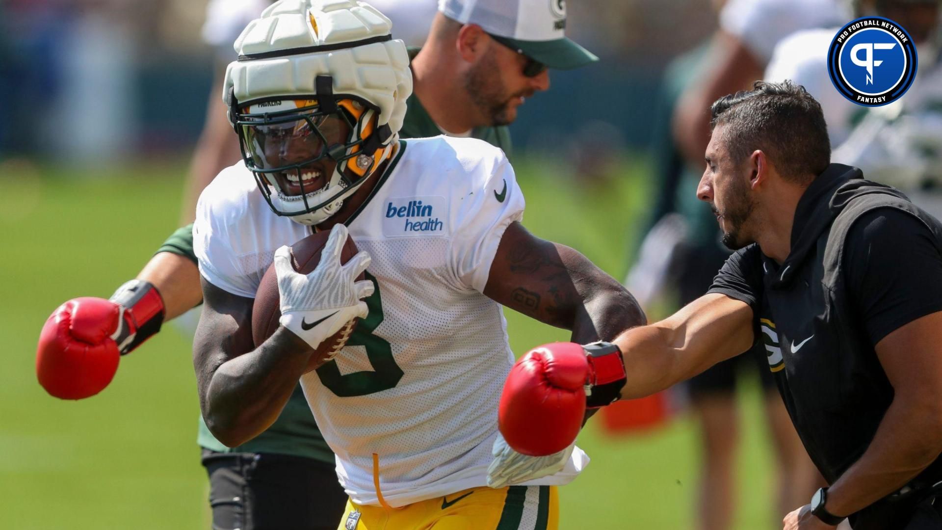 Green Bay Packers running back Josh Jacobs (8) runs through a drill during practice on Wednesday, August 14, 2024, at Ray Nitschke Field in Ashwaubenon, Wis.