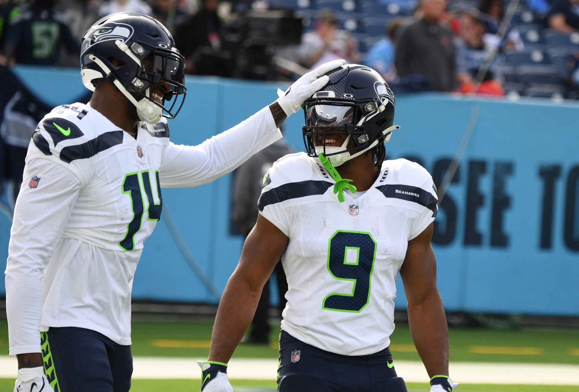 Dec 24, 2023; Nashville, Tennessee, USA; Seattle Seahawks wide receiver DK Metcalf (14) and running back Kenneth Walker III (9) before the game against the Tennessee Titans at Nissan Stadium. Mandatory Credit: Christopher Hanewinckel-USA TODAY Sports