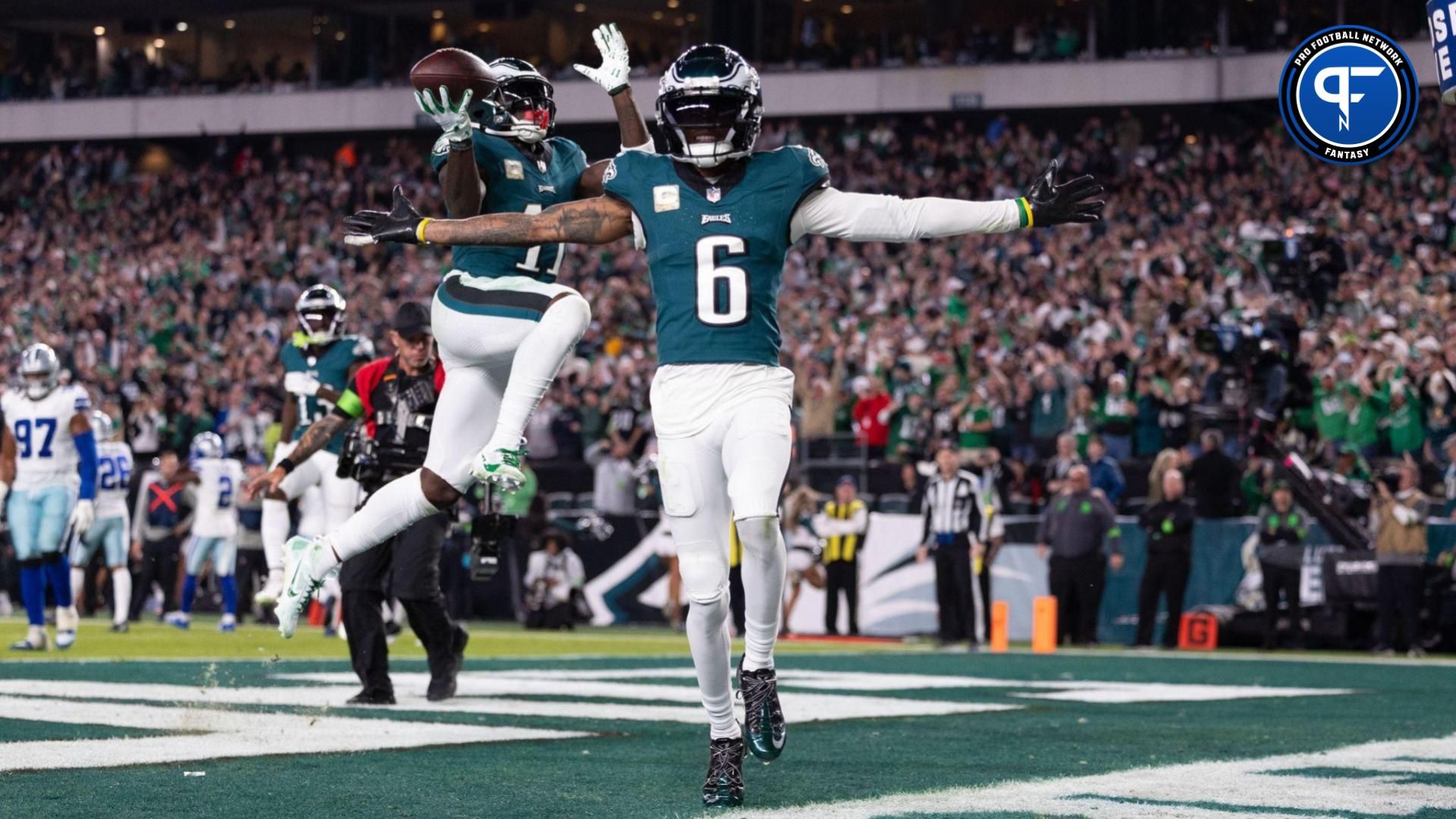 Philadelphia Eagles wide receiver A.J. Brown (11) celebrates his touchdown behind wide receiver DeVonta Smith (6) during the third quarter against the Dallas Cowboys at Lincoln Financial Field.