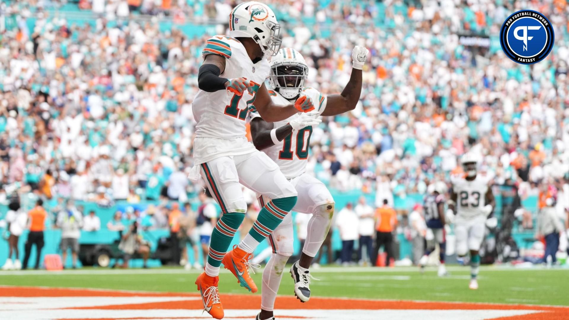 Miami Dolphins wide receiver Jaylen Waddle (17) celebrates his touchdown against the New England Patriots with wide receiver Tyreek Hill (10) during the second half at Hard Rock Stadium.