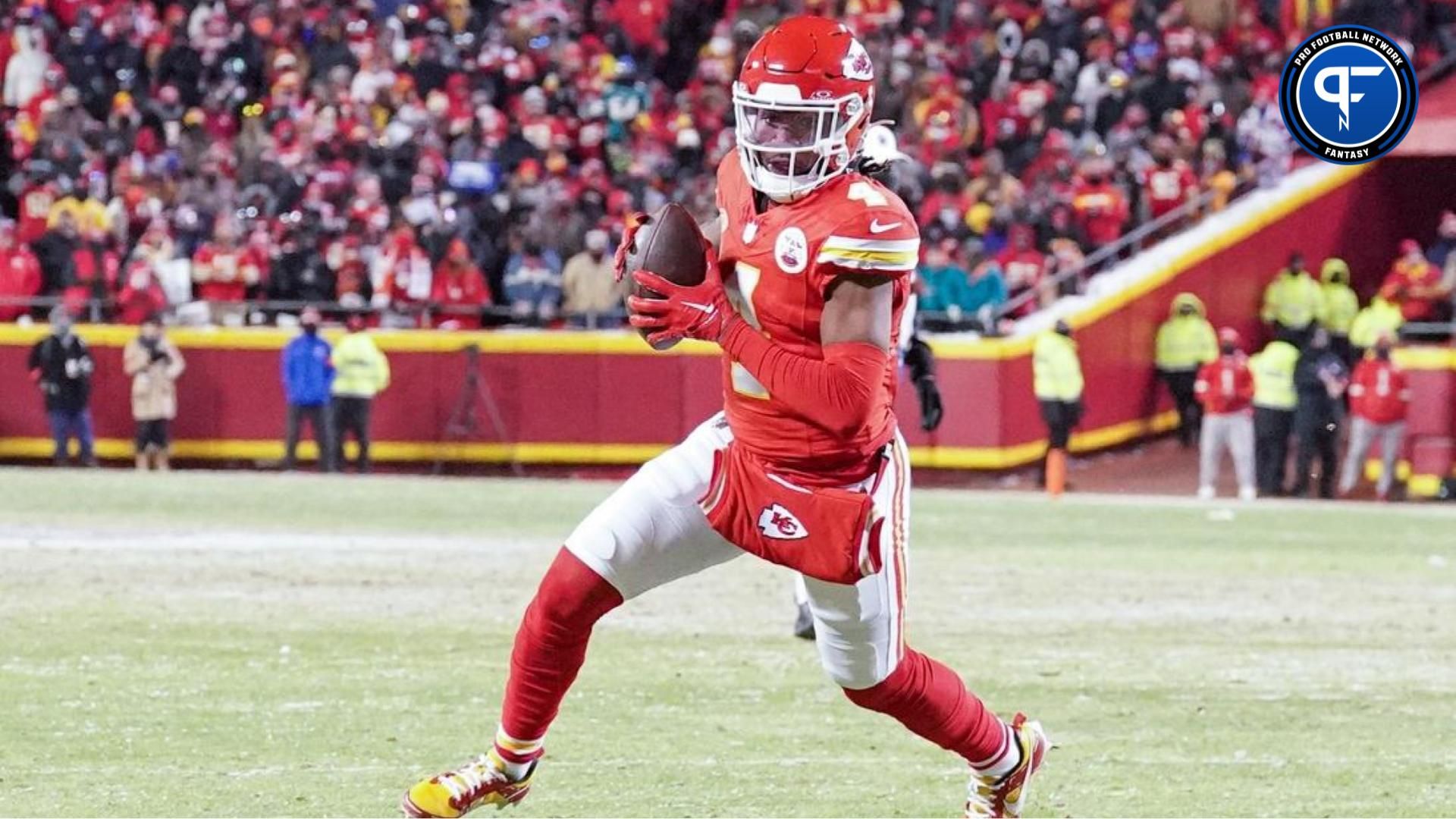 Kansas City Chiefs wide receiver Rashee Rice (4) catches a pass against the Miami Dolphins in a 2024 AFC wild card game at GEHA Field at Arrowhead Stadium. Mandatory Credit: Denny Medley-USA TODAY Sports