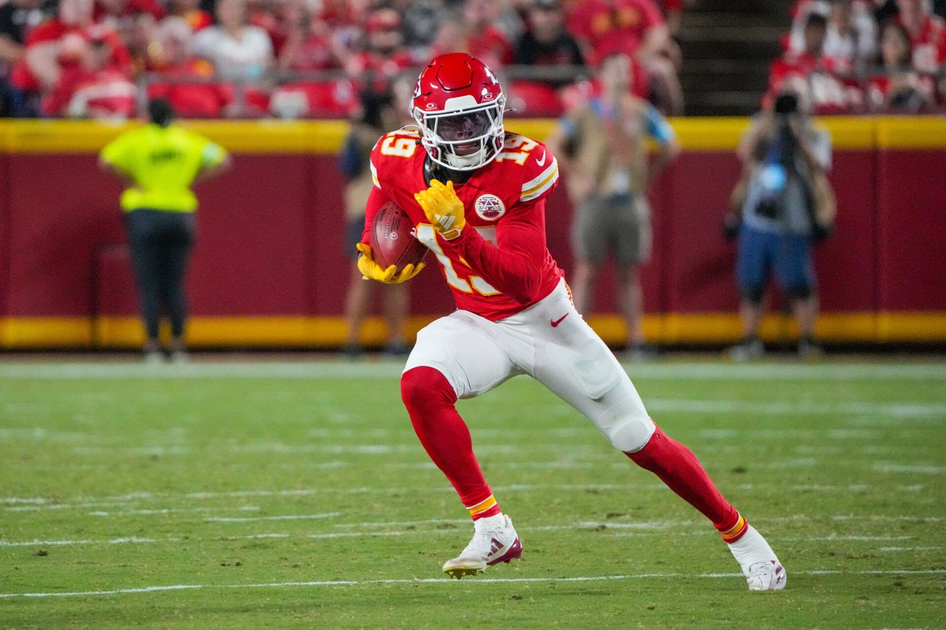 Kansas City Chiefs wide receiver Kadarius Toney (19) returns a kick against the Chicago Bears during the first half at GEHA Field at Arrowhead Stadium.