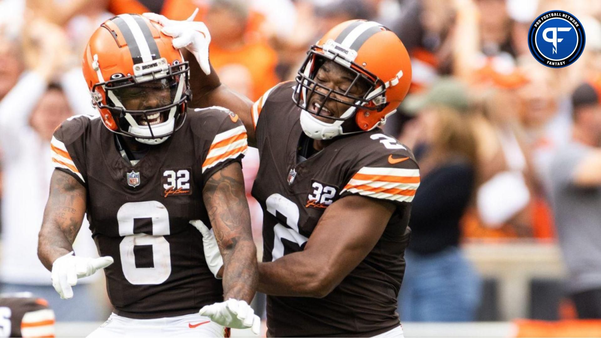 Cleveland Browns wide receiver Amari Cooper (2) celebrates his touchdown reception with wide receiver Elijah Moore (8) during the fourth quarter against the Tennessee Titans at Cleveland Browns Stadium. Mandatory Credit: Scott Galvin-USA TODAY Sports