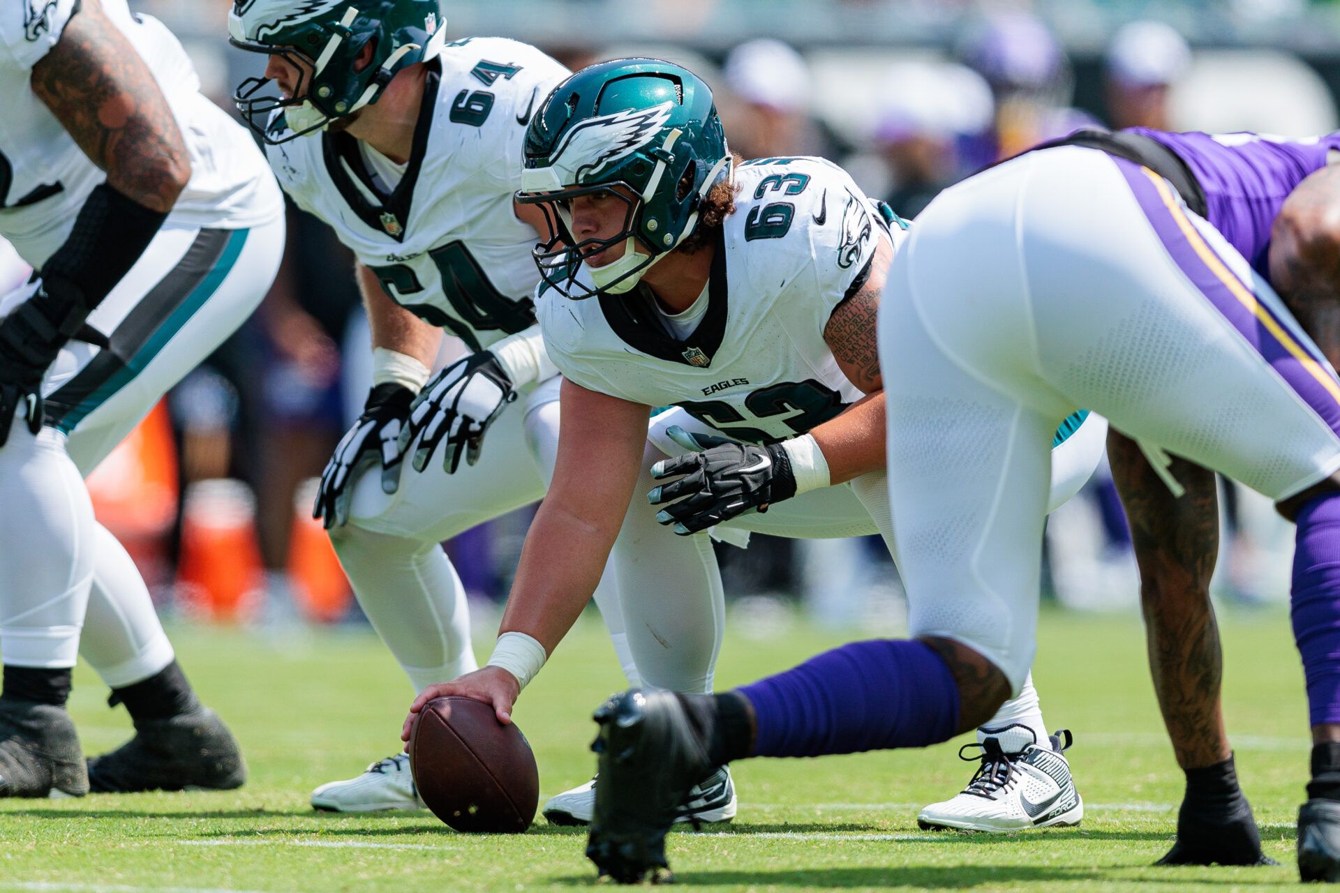 Aug 24, 2024; Philadelphia, Pennsylvania, USA; Philadelphia Eagles center Dylan McMahon (63) prepares to snap the ball against the Minnesota Vikings during the second quarter at Lincoln Financial Field. Mandatory Credit: Caean Couto-USA TODAY Sports