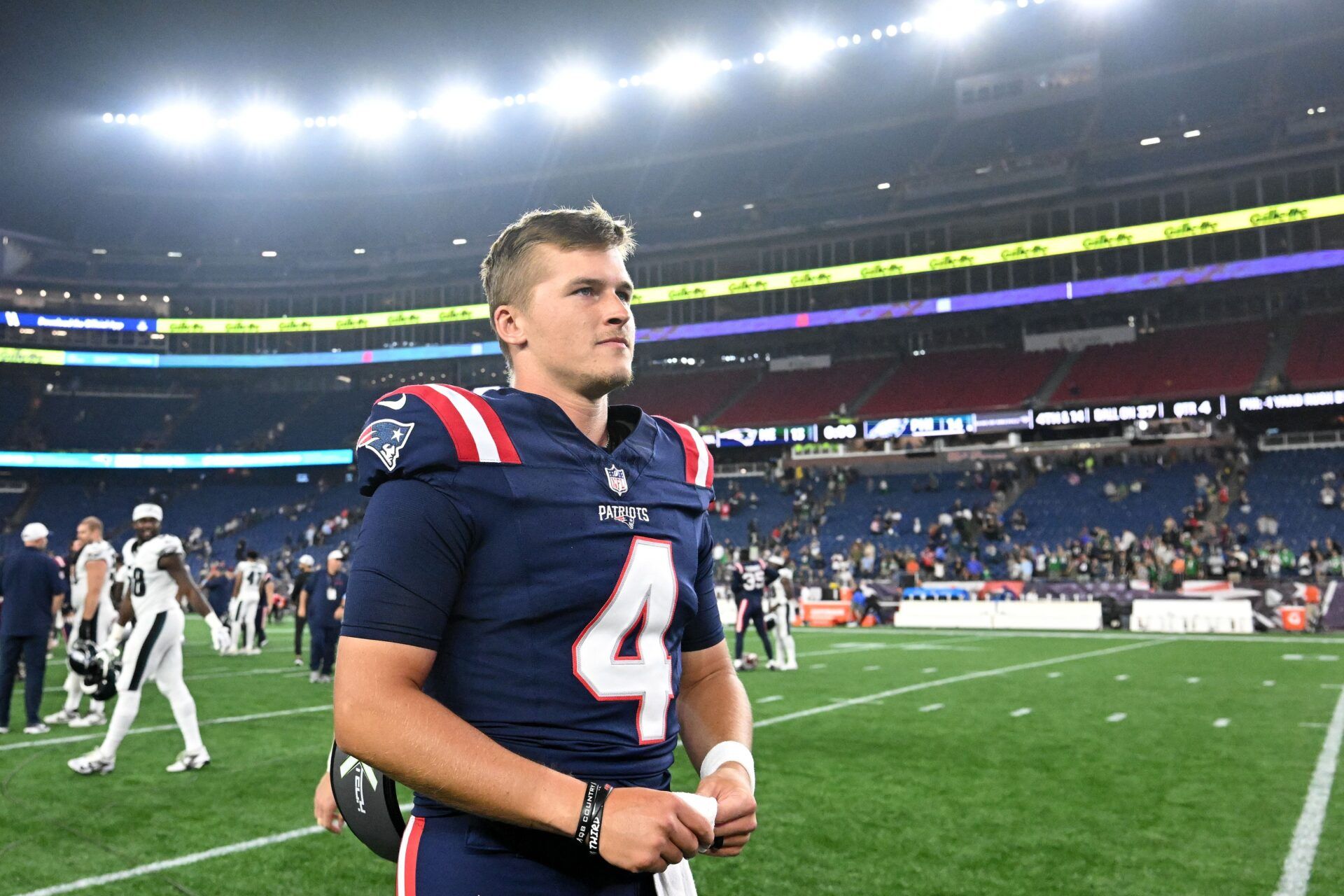 New England Patriots quarterback Bailey Zappe (4) walks off of the field after a game against the Philadelphia Eagles during the second half at Gillette Stadium.