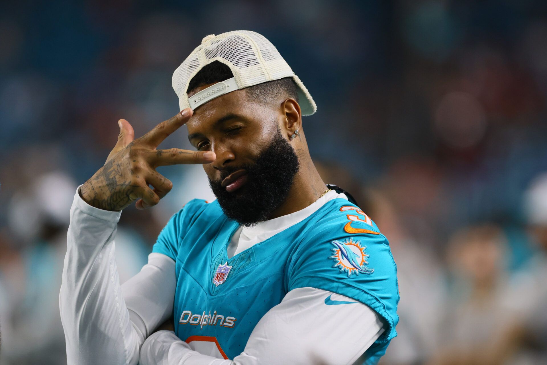 Aug 17, 2024; Miami Gardens, Florida, USA; Miami Dolphins wide receiver Odell Beckham Jr. (3) reacts from the sideline against the Washington Commanders during the fourth quarter of a preseason game at Hard Rock Stadium. Mandatory Credit: Sam Navarro-USA TODAY Sports