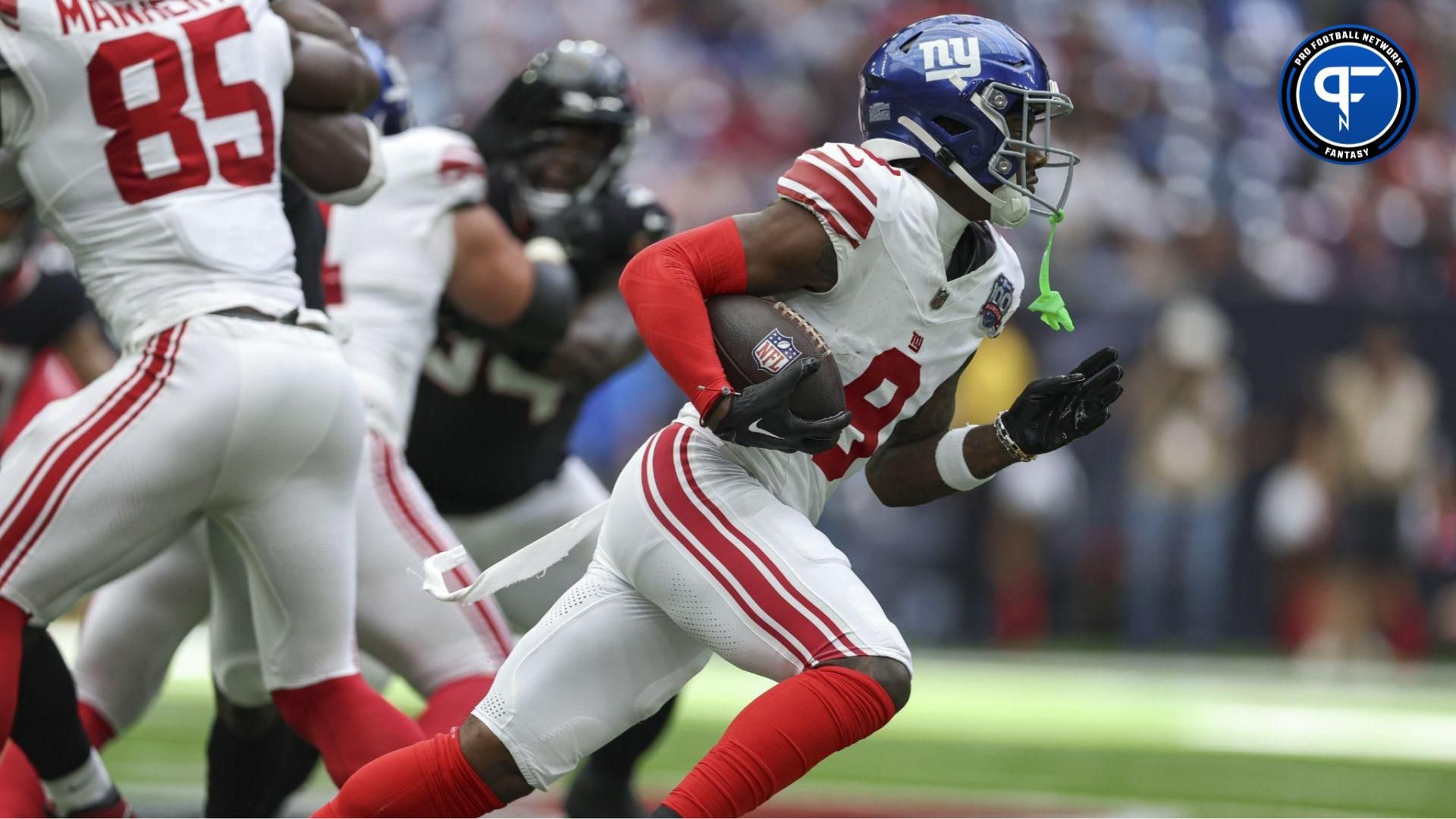 New York Giants wide receiver Malik Nabers (9) runs with the ball during the game against the Houston Texans at NRG Stadium. Mandatory Credit: Troy Taormina-USA TODAY Sports