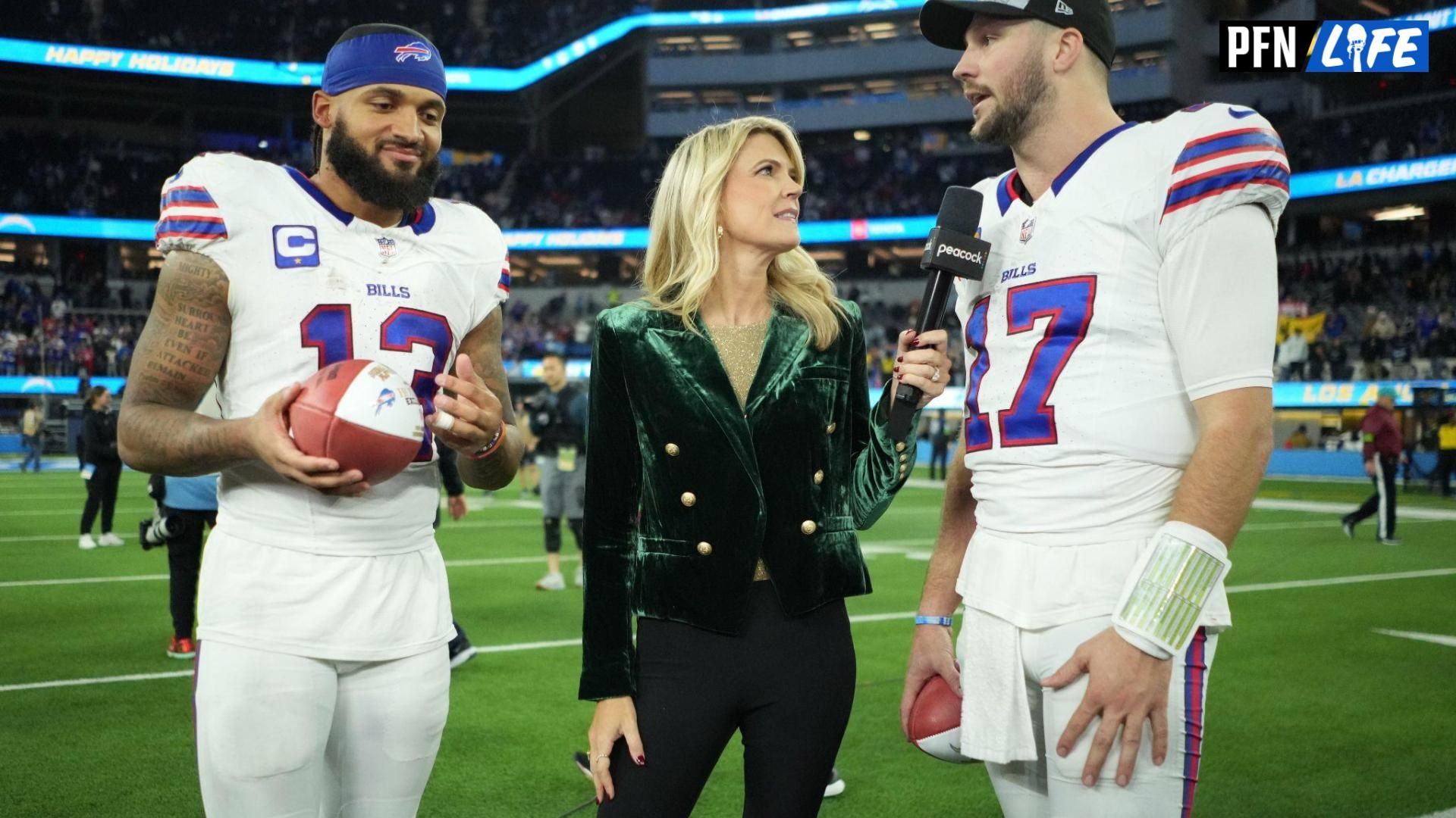 NBC Sports sideline reporter Melissa Stark (center) interviews Buffalo Bills wide receiver Gabe Davis (13) and quarterback Josh Allen (17) after the game against the Los Angeles Chargers at SoFi Stadium.