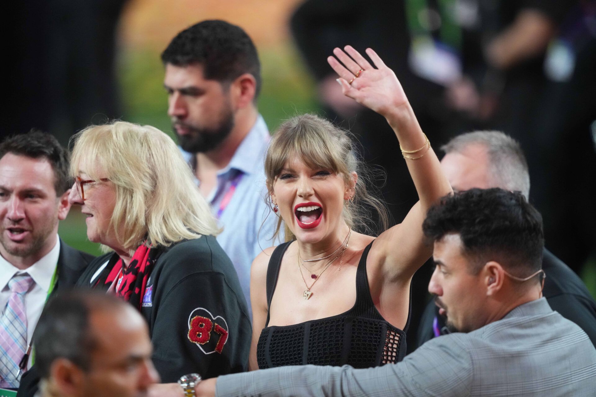 Feb 11, 2024; Paradise, Nevada, USA; Recording artist Taylor Swift enters the field as Kansas City Chiefs wins over the San Francisco 49ers in overtime of Super Bowl LVIII at Allegiant Stadium. Mandatory Credit: Joe Camporeale-USA TODAY Sports