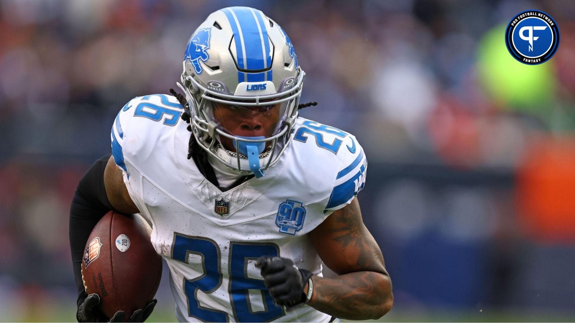 Detroit Lions running back Jahmyr Gibbs (26) rushes the ball for a touchdown against the Chicago Bears during the first half at Soldier Field. Mandatory Credit: Mike Dinovo-USA TODAY Sports