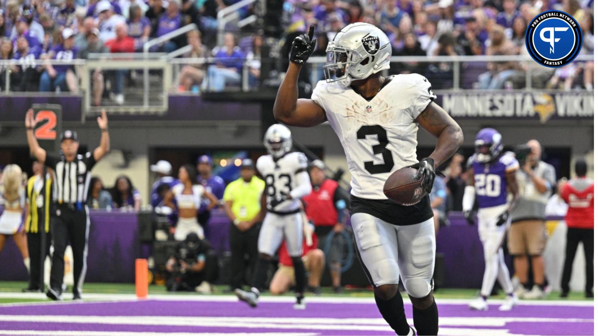 Aug 10, 2024; Minneapolis, Minnesota, USA; Las Vegas Raiders running back Zamir White (3) runs for a touchdown against the Minnesota Vikings during the third quarter at U.S. Bank Stadium. Mandatory Credit: Jeffrey Becker-USA TODAY Sports