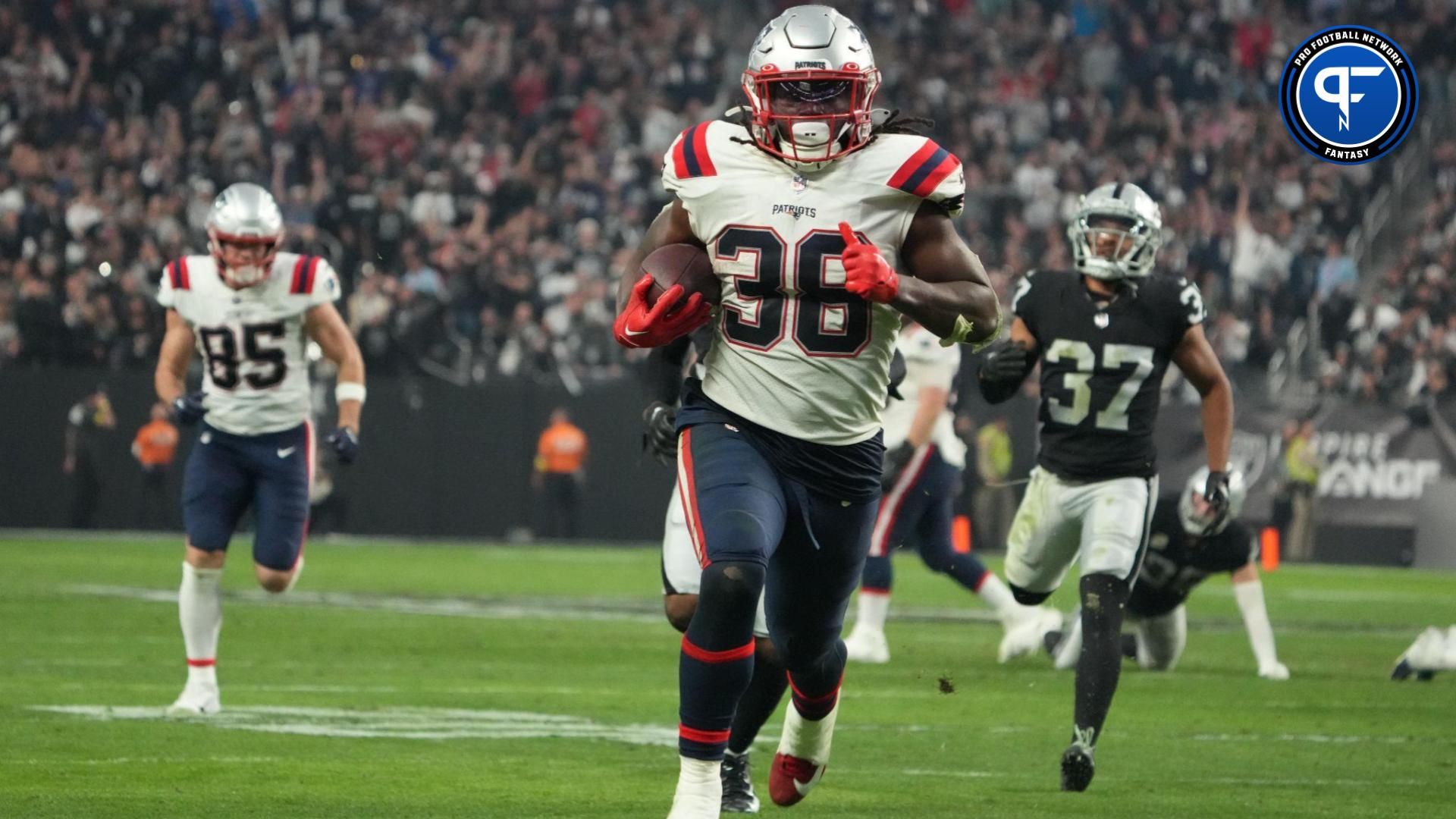 Dec 18, 2022; Paradise, Nevada, USA; New England Patriots running back Rhamondre Stevenson (38) scores on a 34-yard touchdown run in the second half against the Las Vegas Raiders at Allegiant Stadium. The Raiders defeated the Patriots 30-24. Mandatory Credit: Kirby Lee-USA TODAY Sports