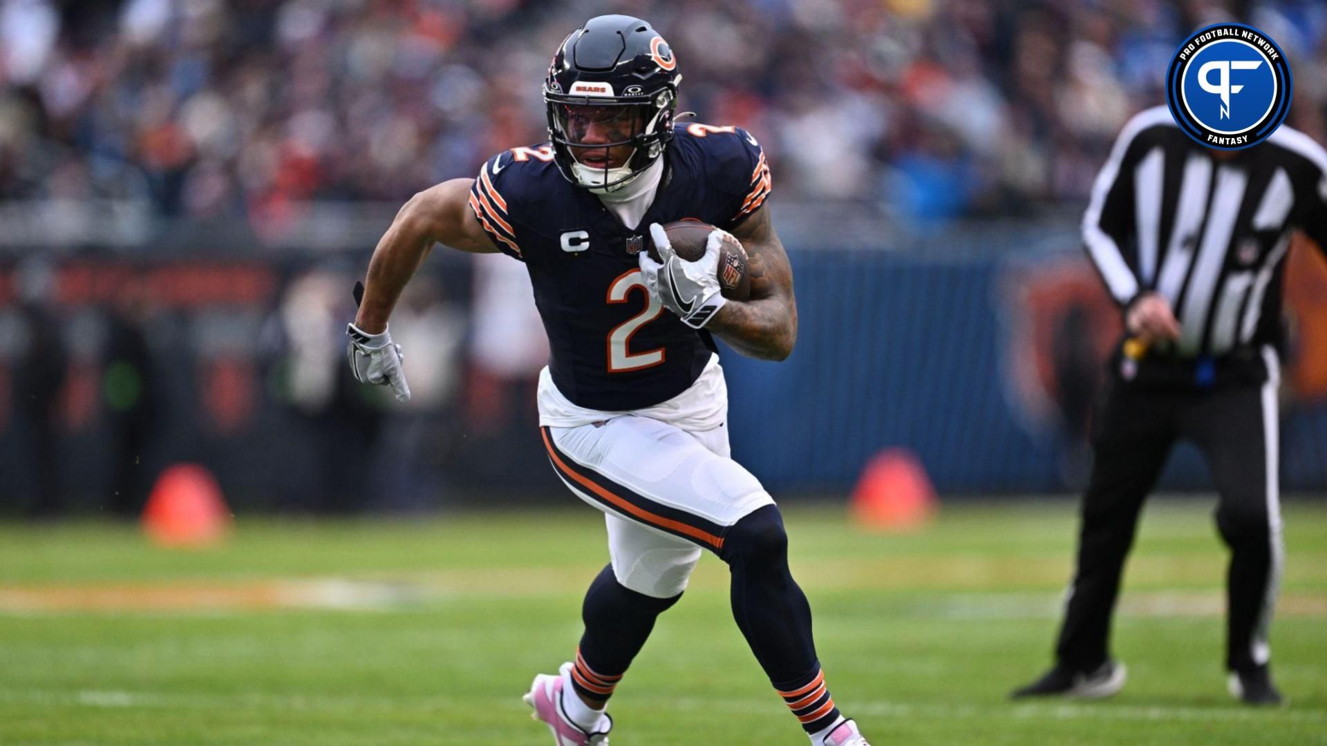 Chicago Bears wide receiver DJ Moore (2) takes off on a 16-yard touchdown run in the first half against the Detroit Lions at Soldier Field. Mandatory Credit: Jamie Sabau-USA TODAY Sports