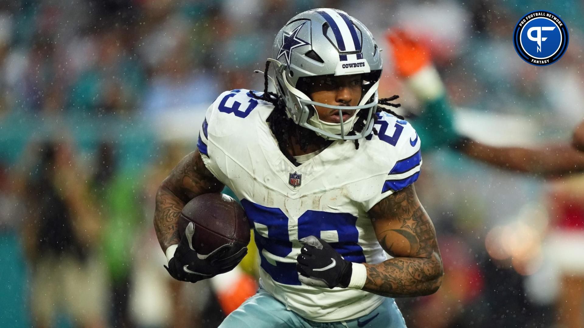 Dallas Cowboys running back Rico Dowdle (23) rushes with the ball during the first half against the Miami Dolphins at Hard Rock Stadium. Mandatory Credit: Jasen Vinlove-USA TODAY Sports