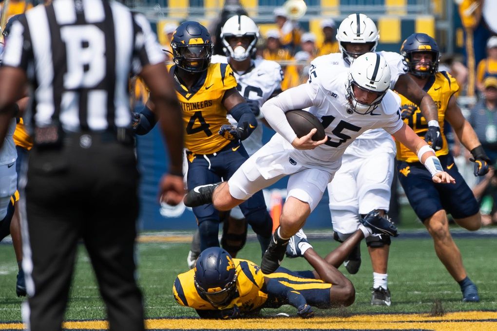 Penn State quarterback Drew Allar (15) runs up the middle in the first half of an NCAA football game against West Virginia, Saturday, August 31, 2024, in Morgantown, W. Va. Where will he land in the 2025 NFL Draft?