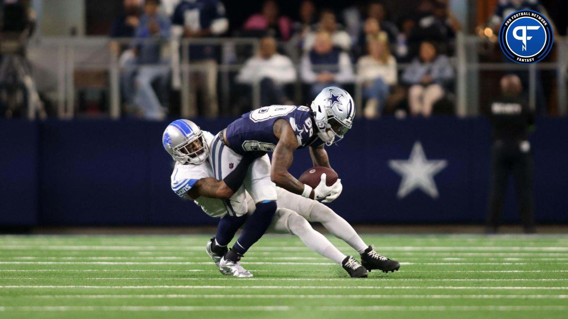 Dallas Cowboys wide receiver CeeDee Lamb (88) catches a pass against Detroit Lions cornerback Cameron Sutton (1) in the second half at AT&T Stadium.