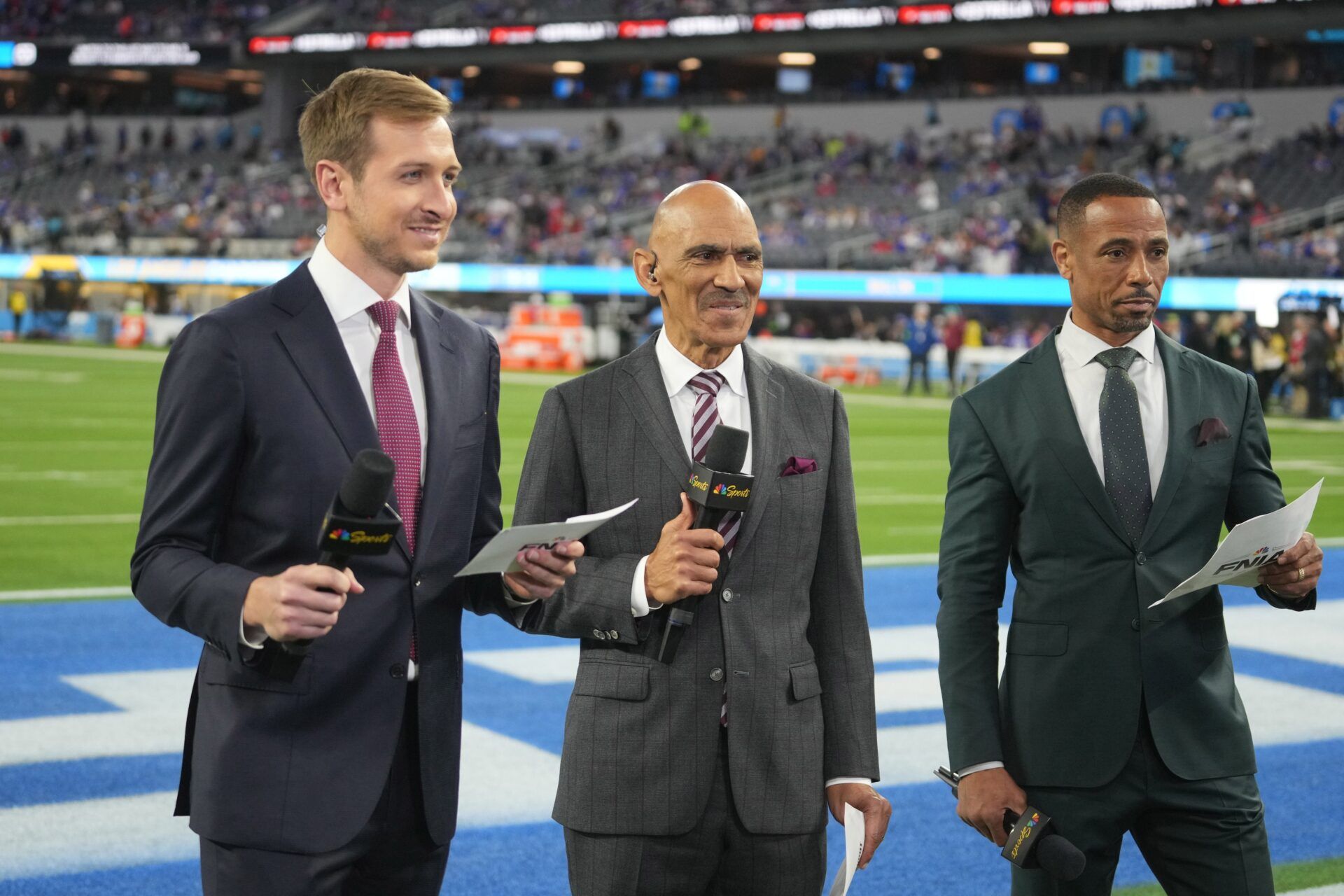 NBC Sports broadcasters Jac Collinsworth (left), Tony Dungy (center) and Rodney Harrison during the game between the Los Angeles Chargers and the Buffalo Bills at SoFi Stadium.