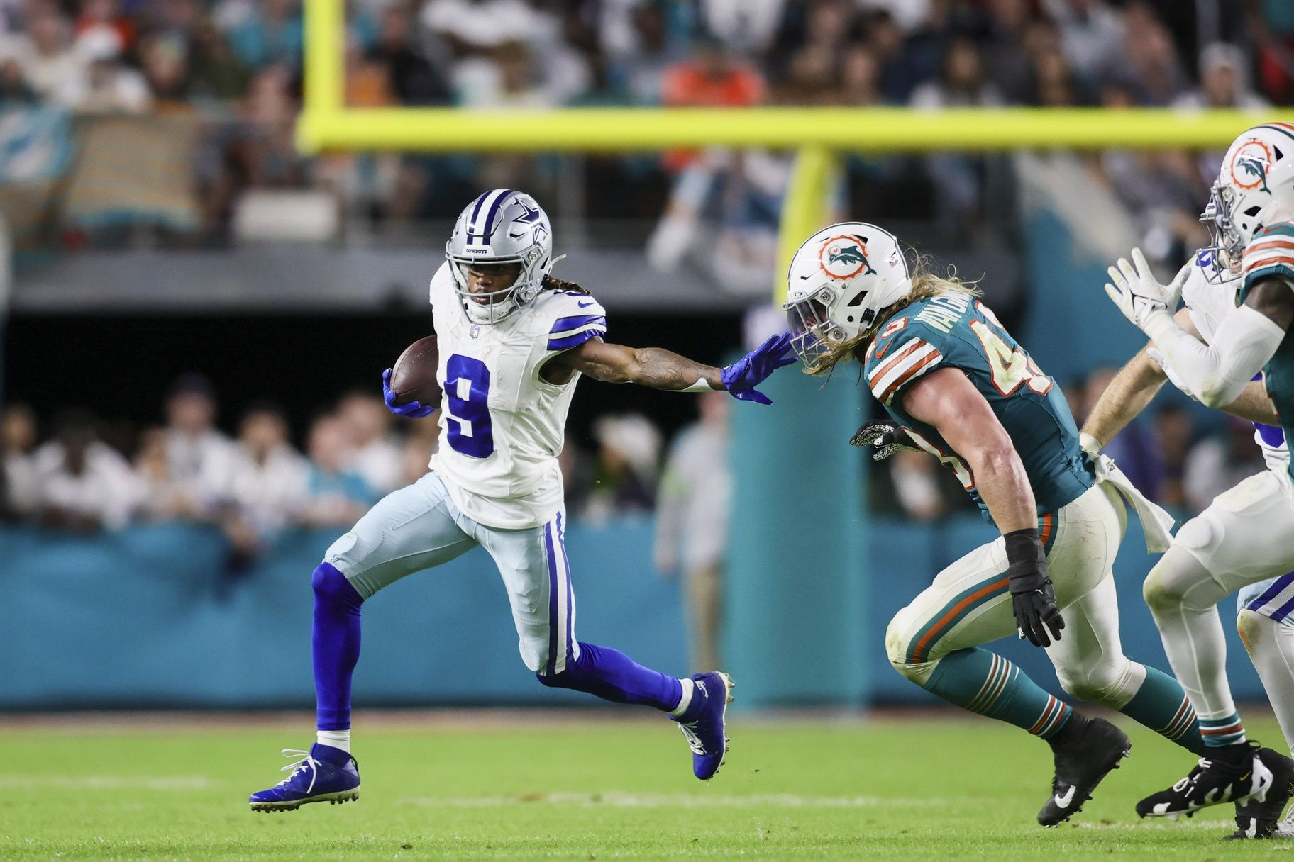 Dallas Cowboys wide receiver KaVontae Turpin (9) runs with the football against Miami Dolphins linebacker Andrew Van Ginkel (43) during the fourth quarter at Hard Rock Stadium. Mandatory Credit: Sam Navarro-USA TODAY Sports